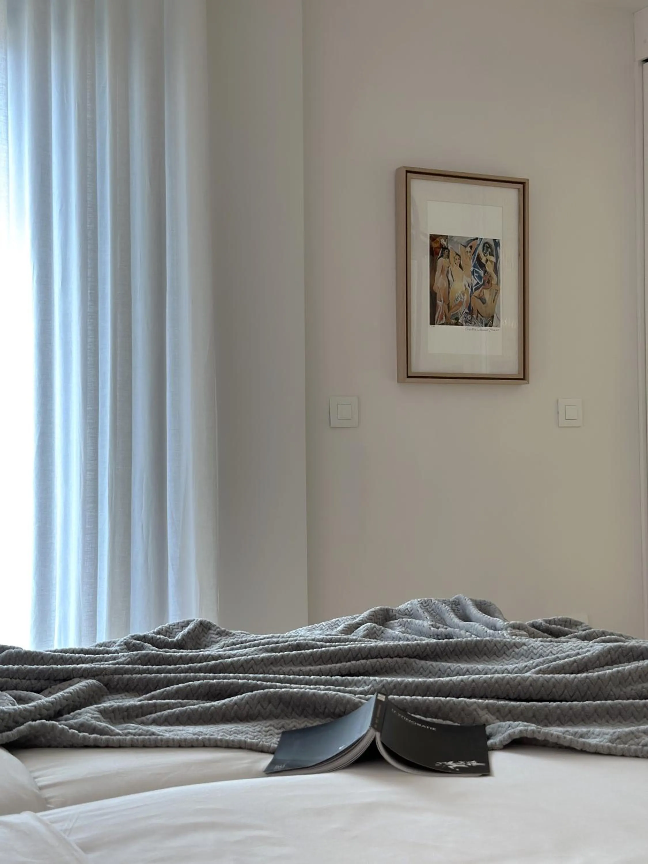 Bed in AIONION RESIDENCES by K&K