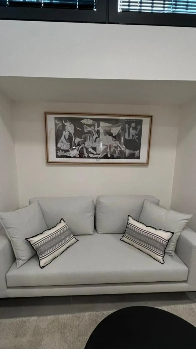 Seating area in AIONION RESIDENCES by K&K