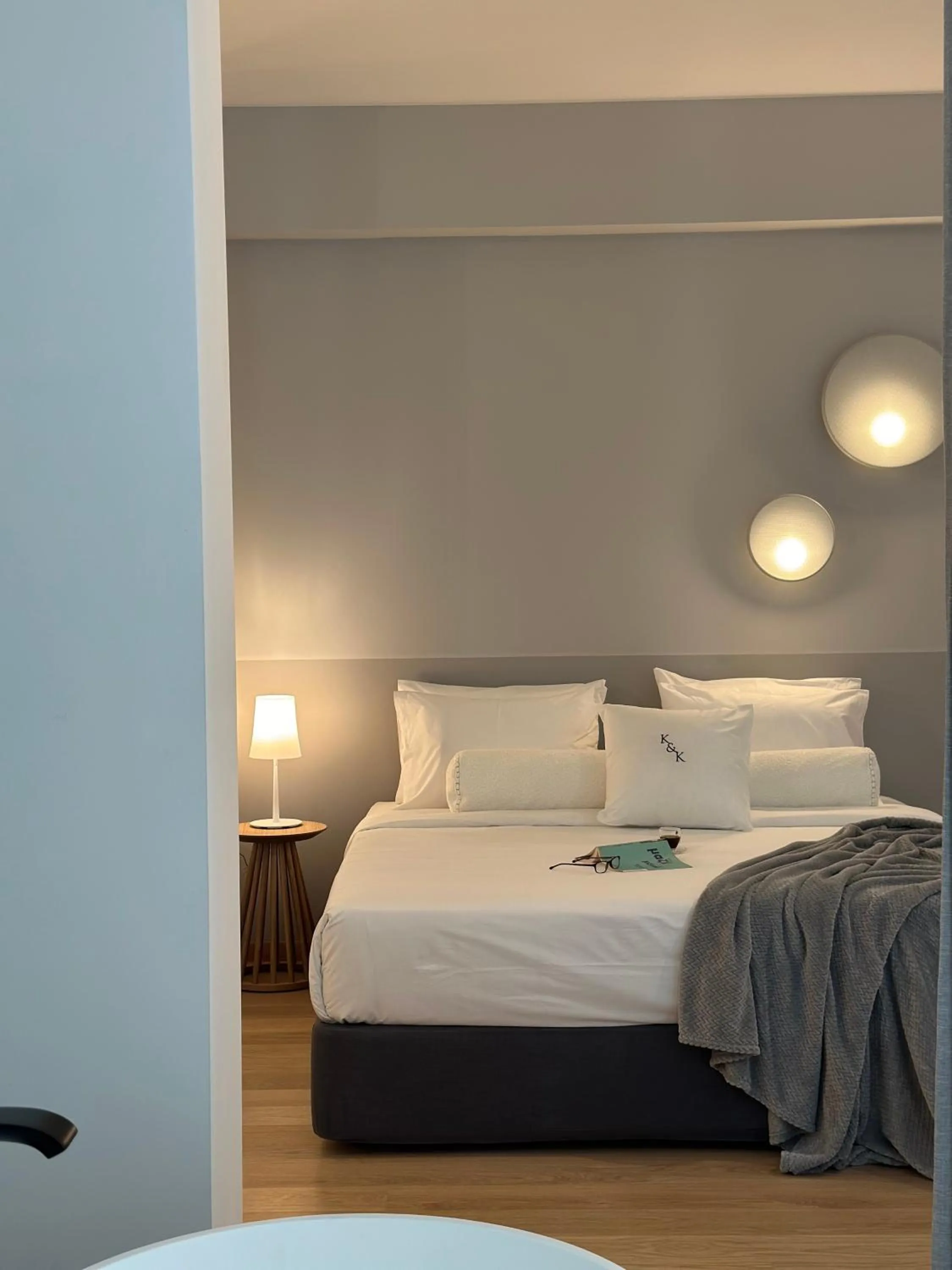 Bed in AIONION RESIDENCES by K&K