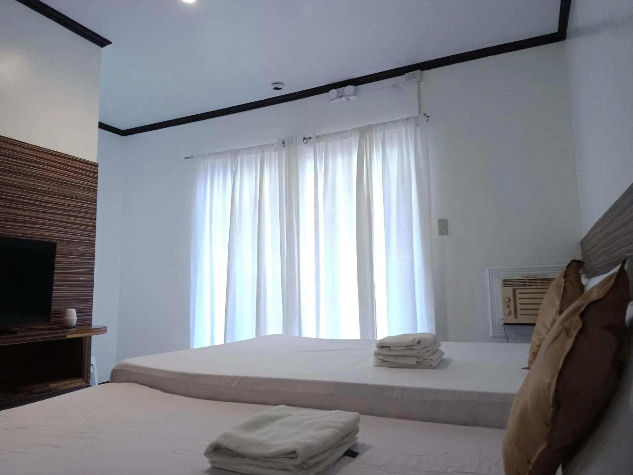 Bed in VILLA LOURDES RESORT