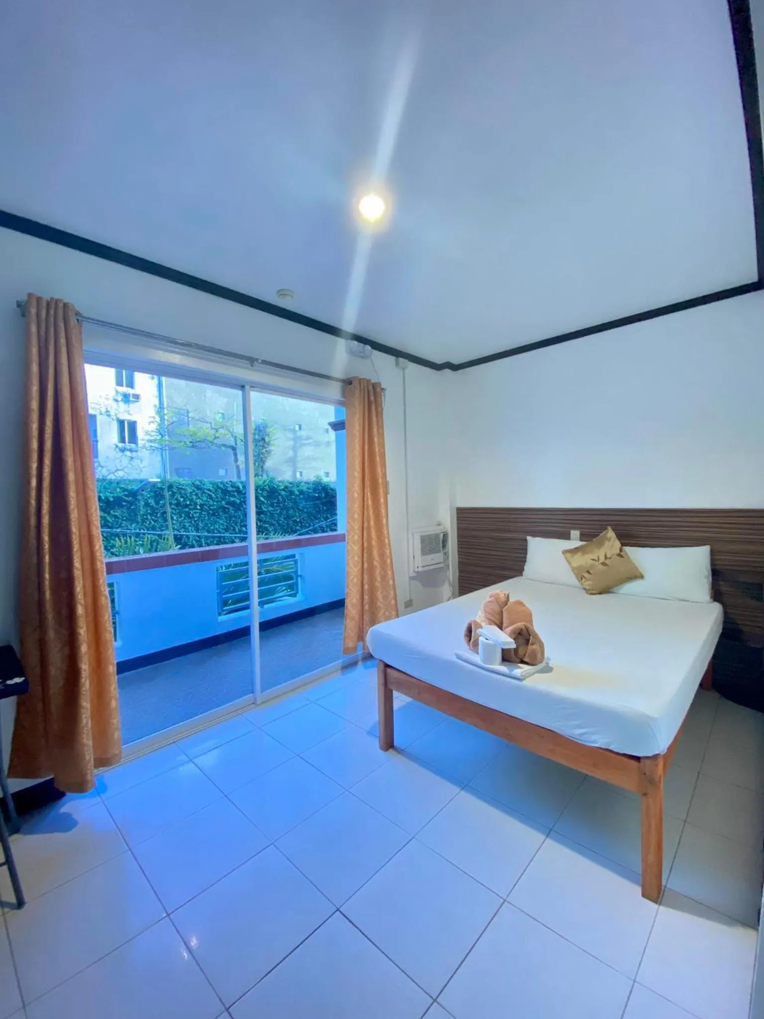 Bed in VILLA LOURDES RESORT