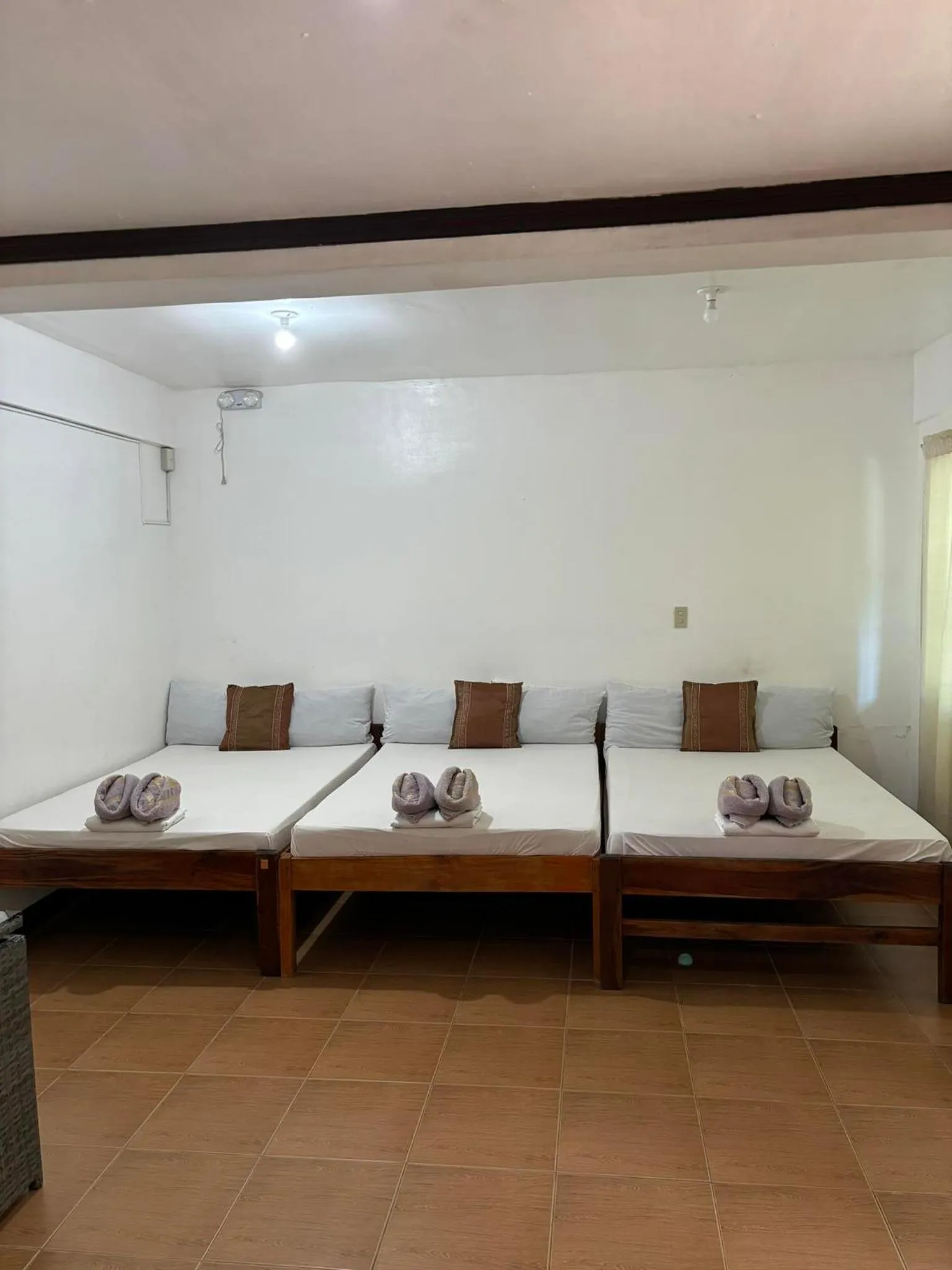 Bed in VILLA LOURDES RESORT