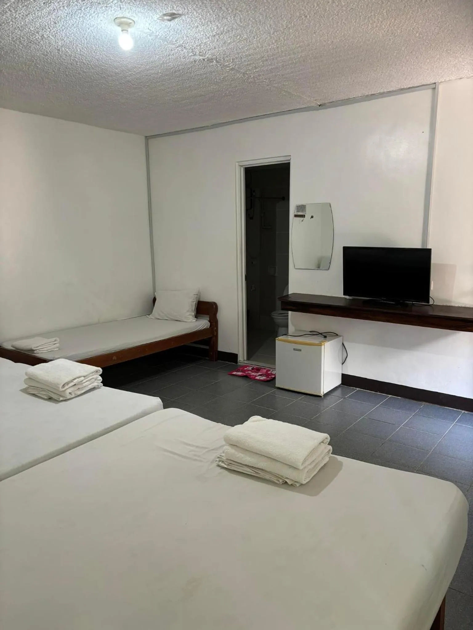 Bed in VILLA LOURDES RESORT