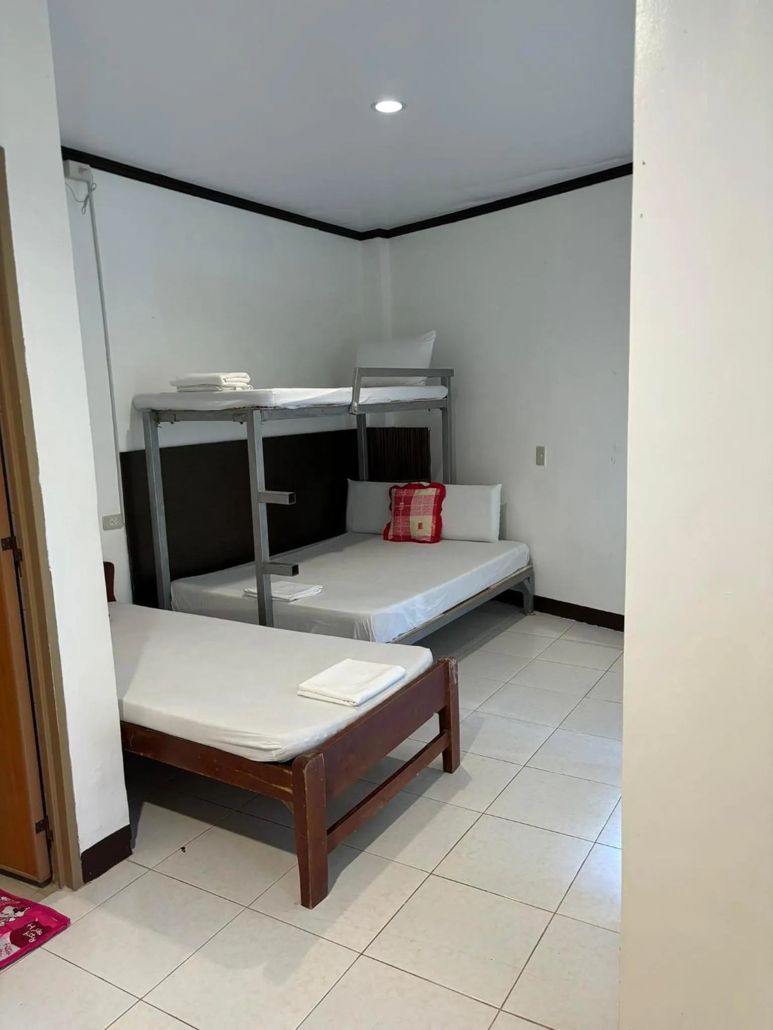 Bed in VILLA LOURDES RESORT