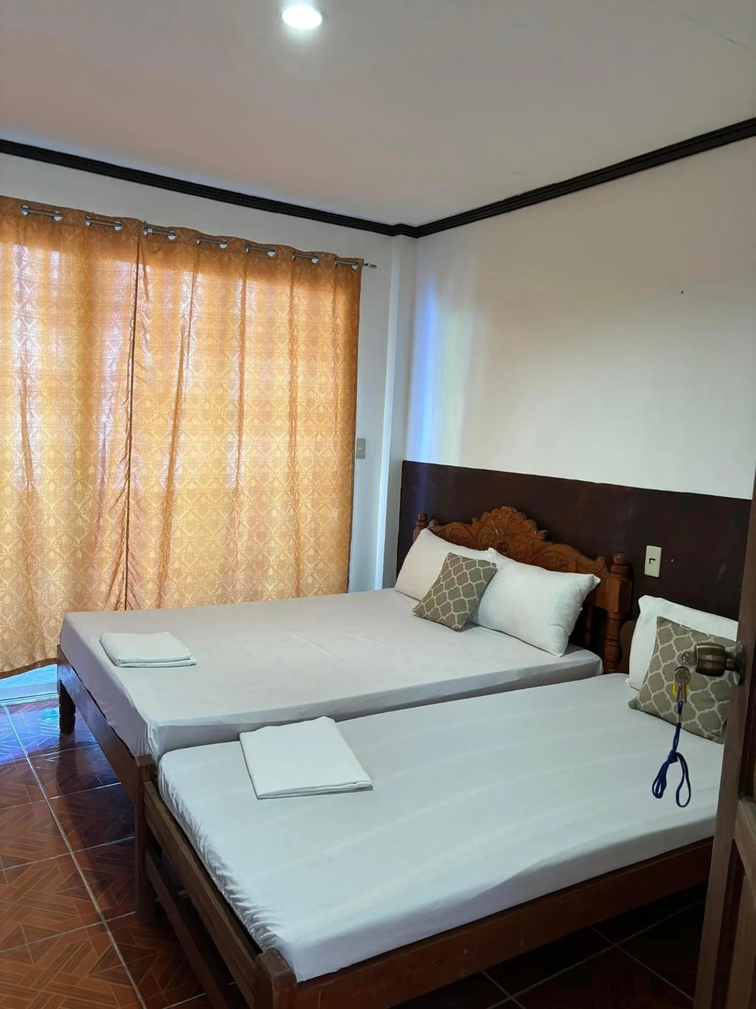 Bed in VILLA LOURDES RESORT