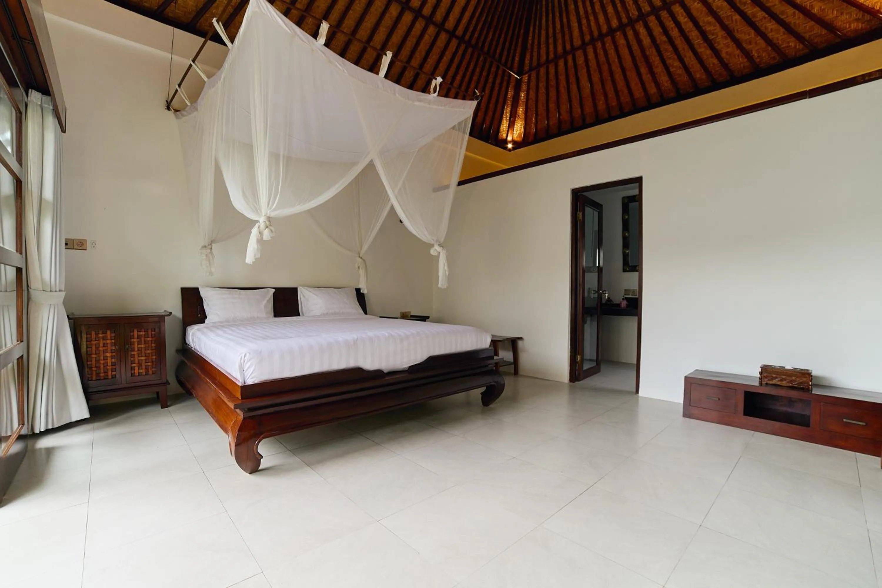 Bed in Cantik ArtVilla for big company by ArthouseBali