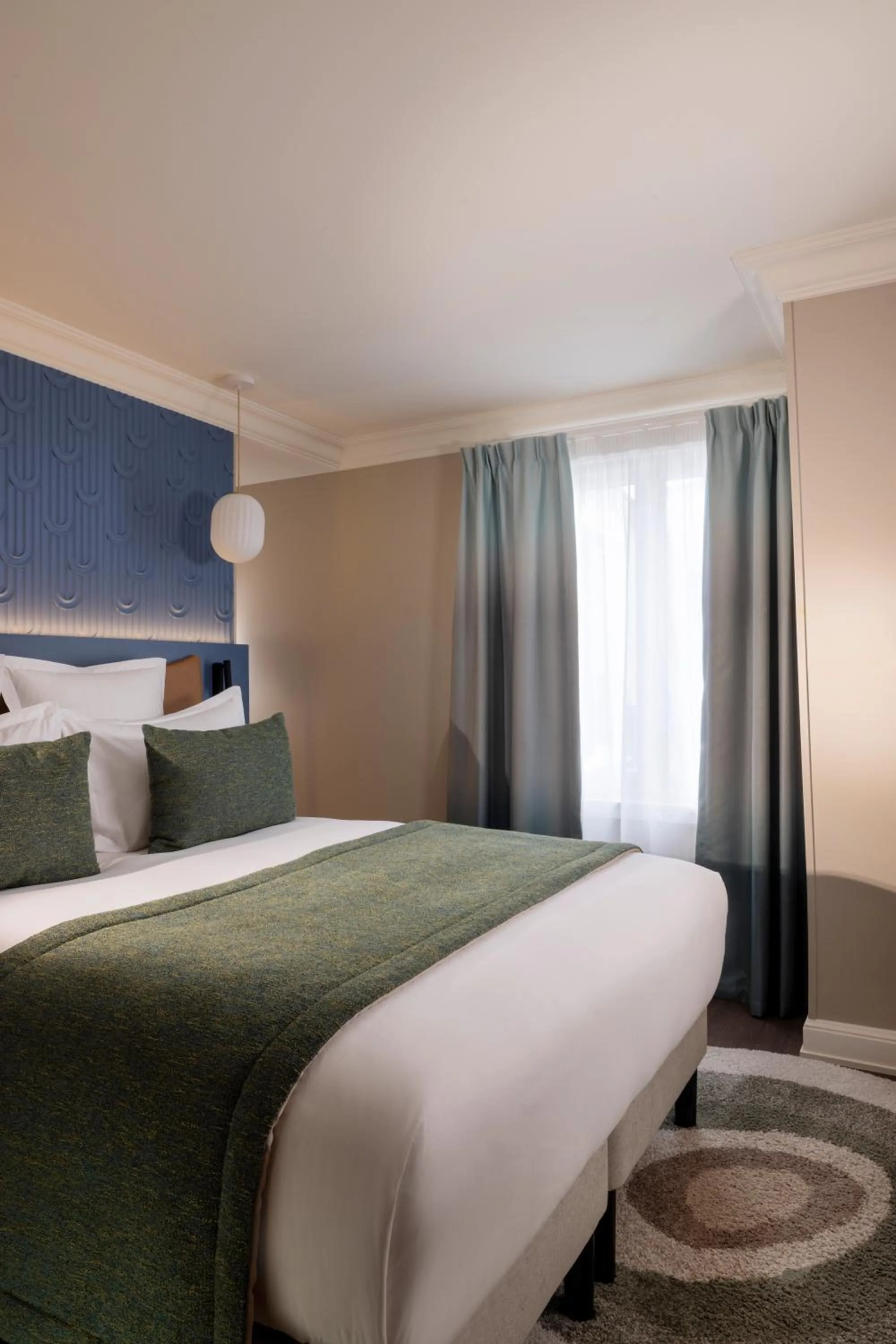 Bed in Hôtel L'Ormaie & Spa