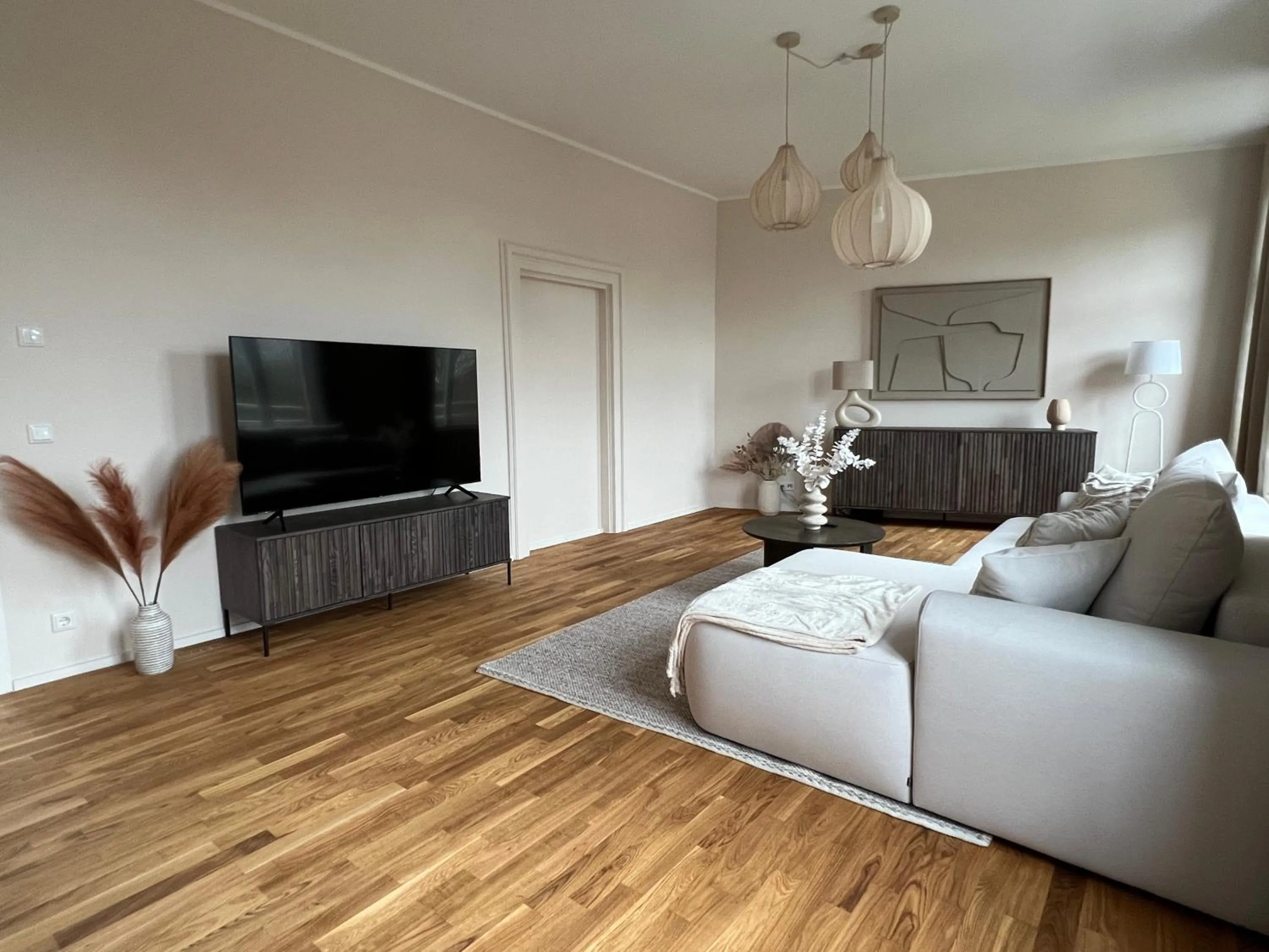 TV and multimedia in AMAYA LIVING 80qm Japandi Krefeld Zentrum