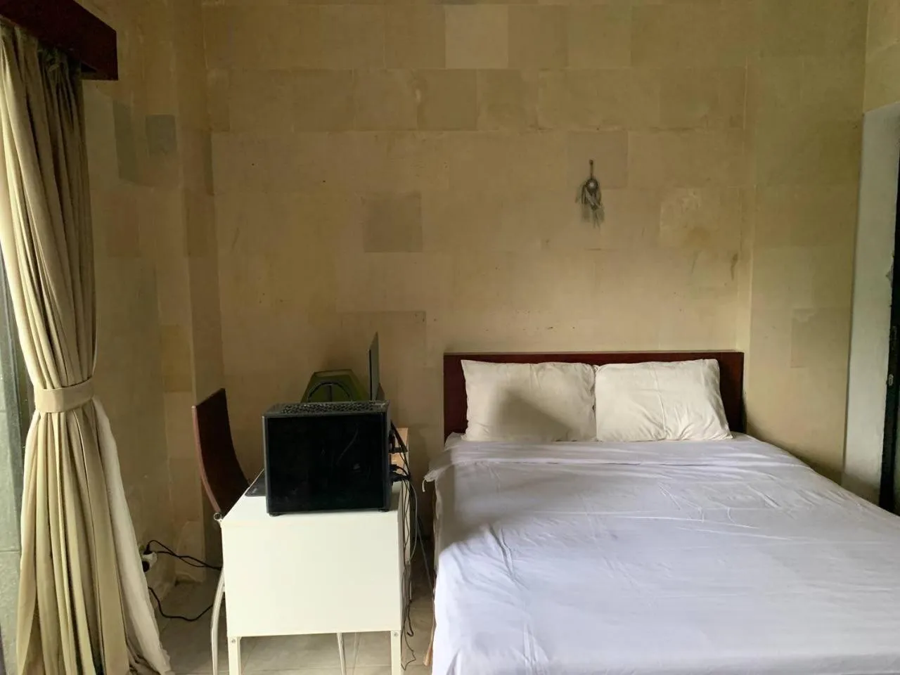 Bed in Cozy Palm Villa