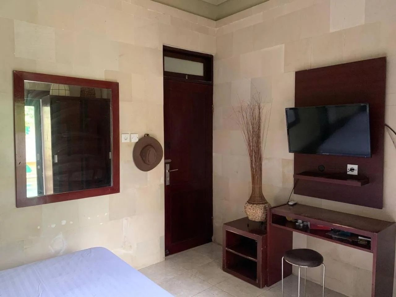 Bed in Cozy Palm Villa