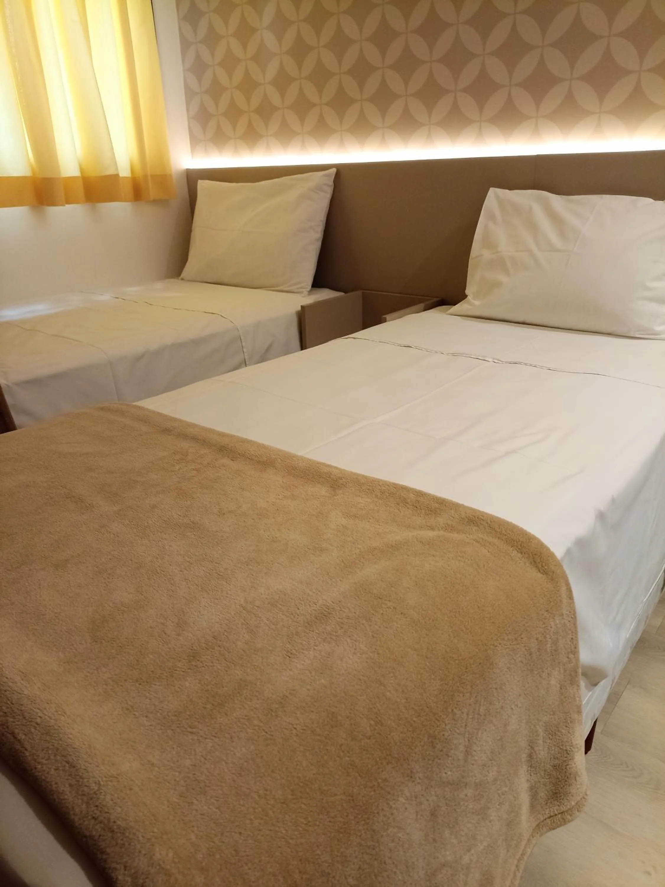 Bed in Hotel Arujá