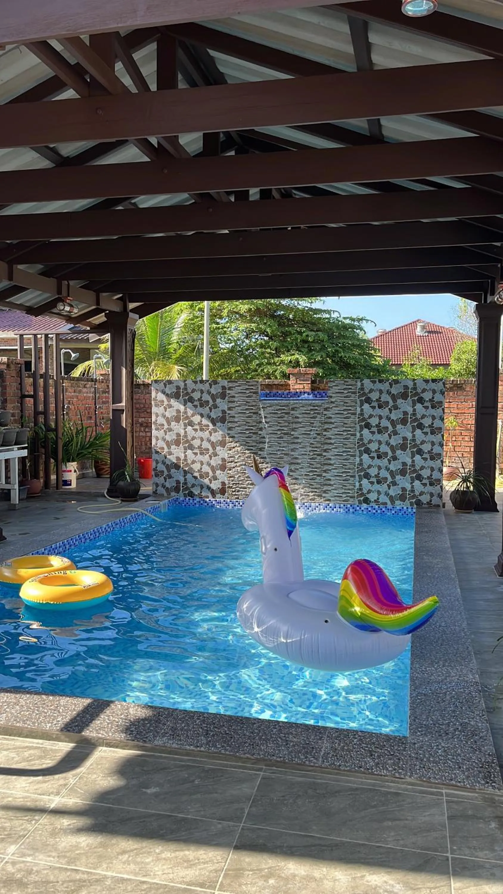 Swimming pool in Maifa Village Chalet