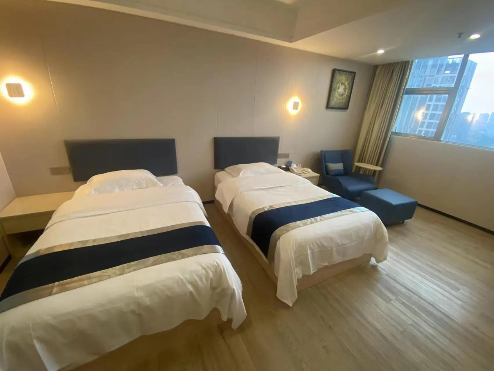 Bed in Green Island Holiday Hotel