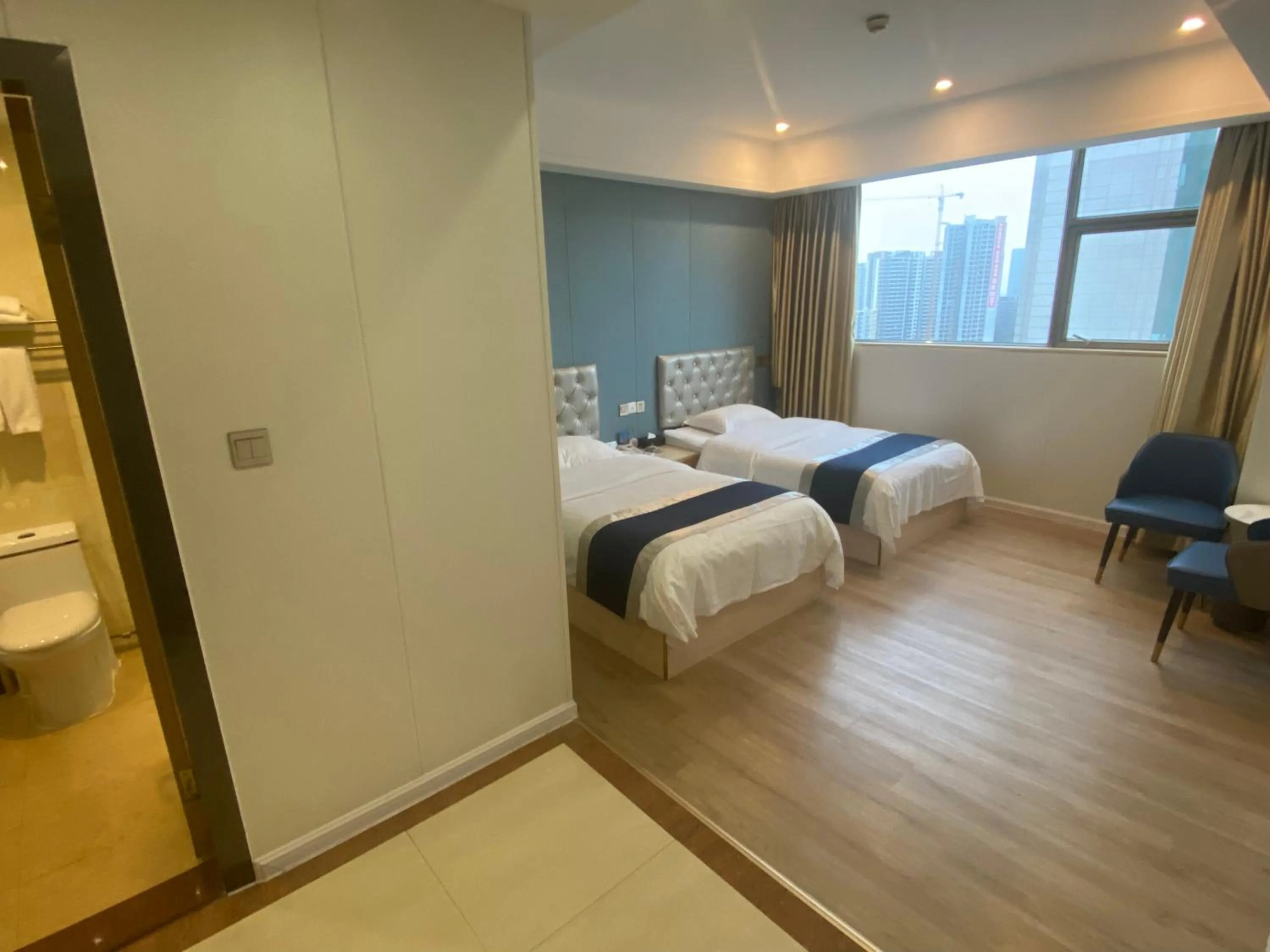 Photo of the whole room, Bed in Green Island Holiday Hotel