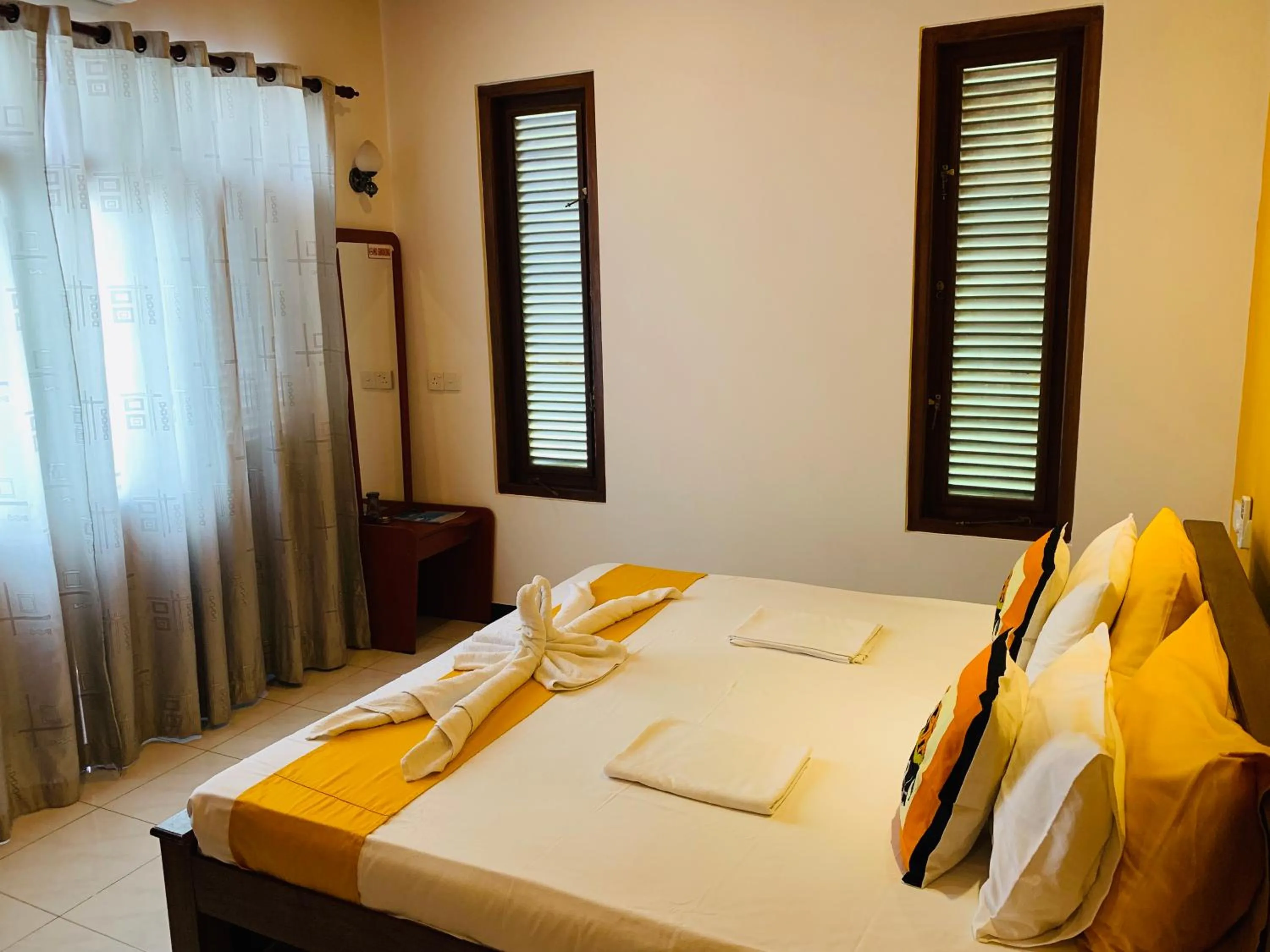 Bed in Sam's Guest House