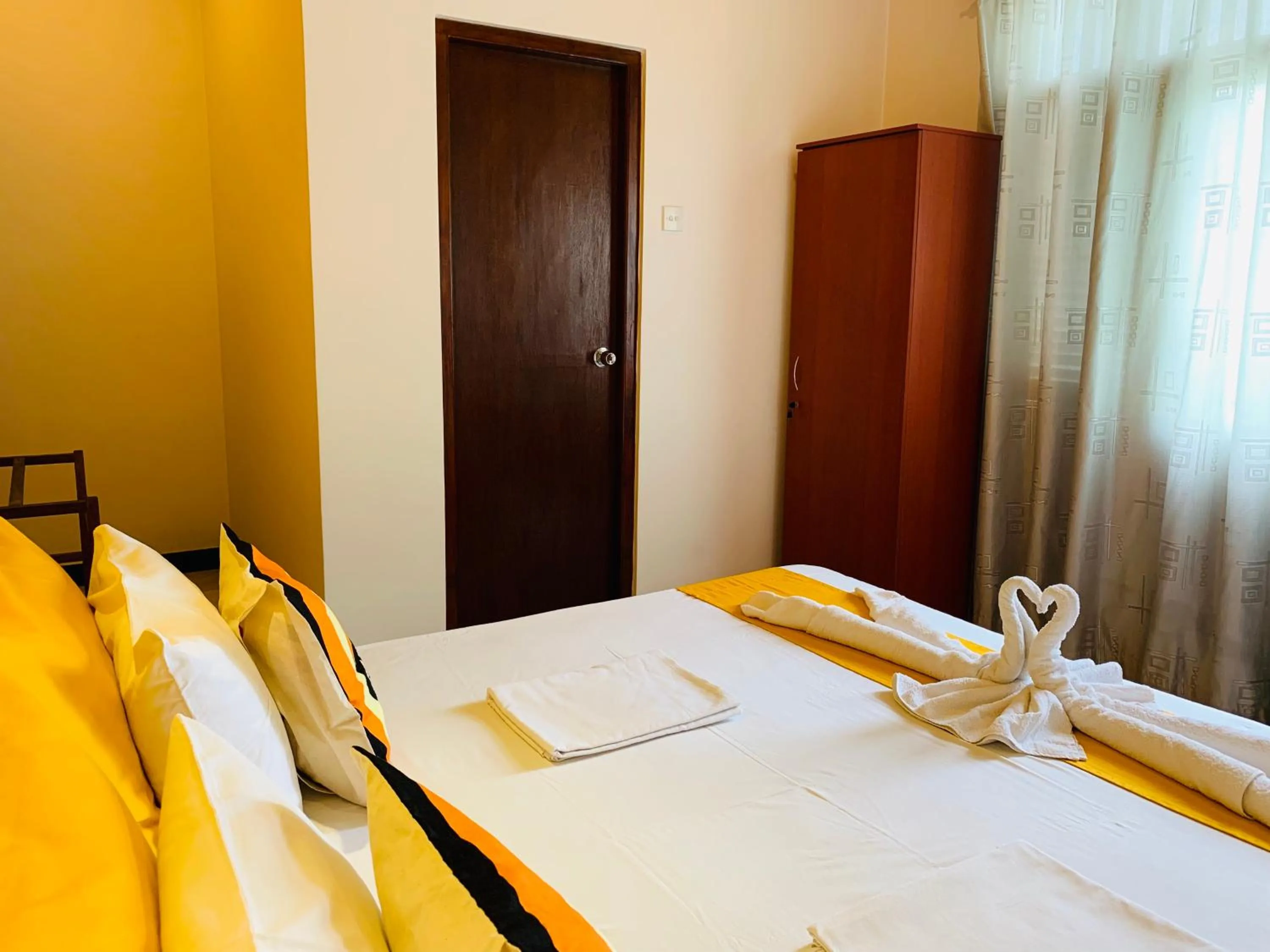 Bed in Sam's Guest House