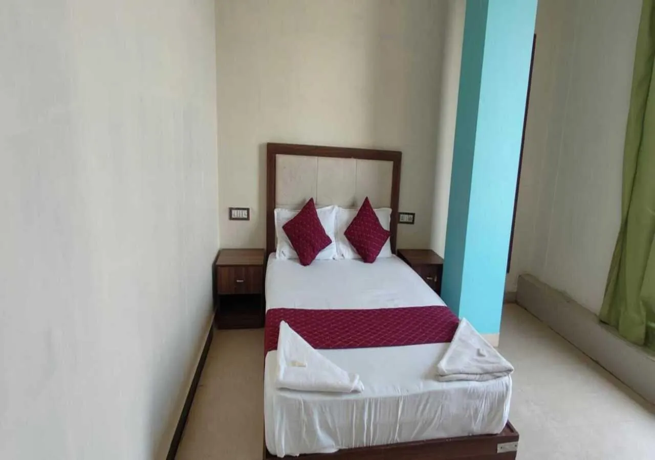 Bed in Hotel Blue Sky Residency