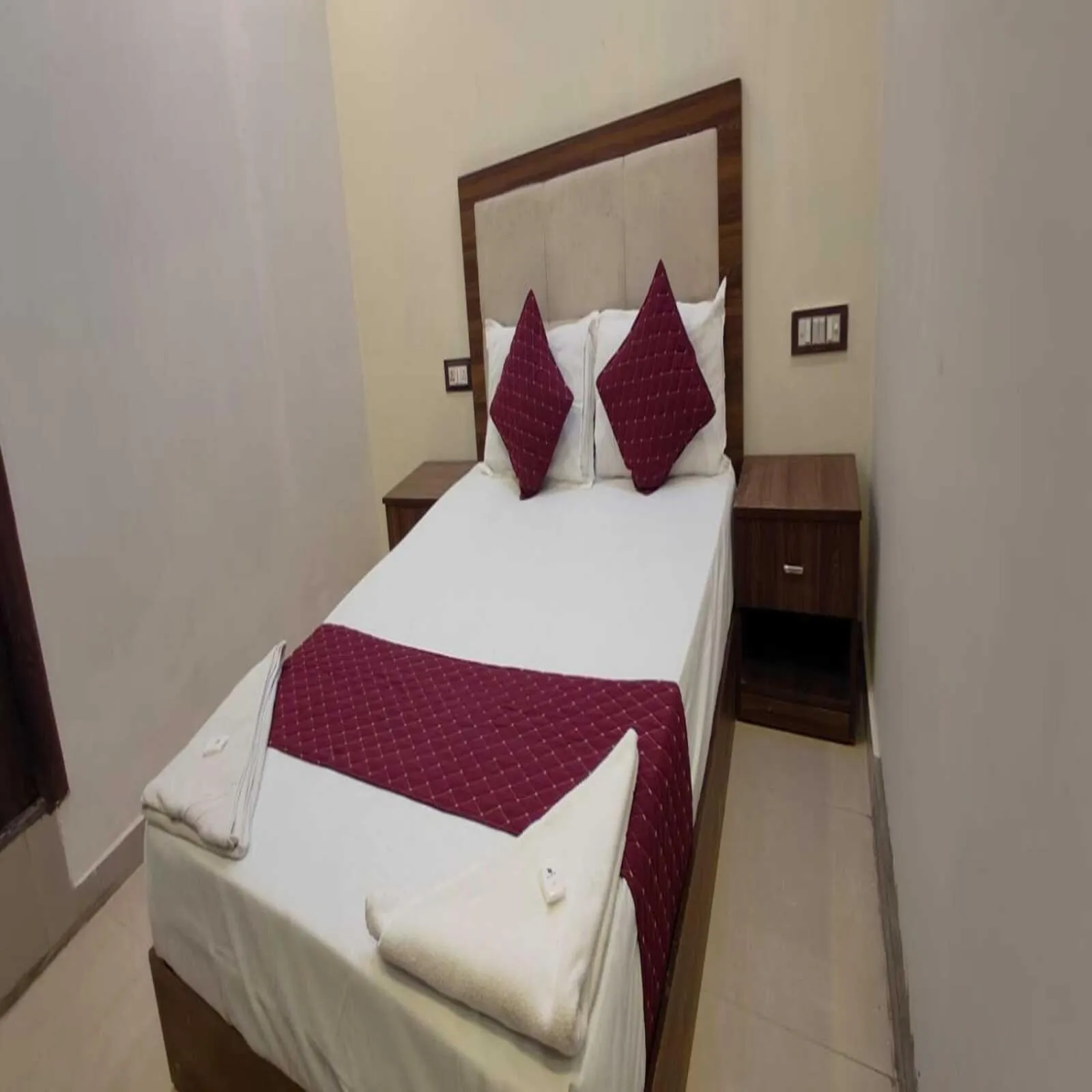 Bed in Hotel Blue Sky Residency