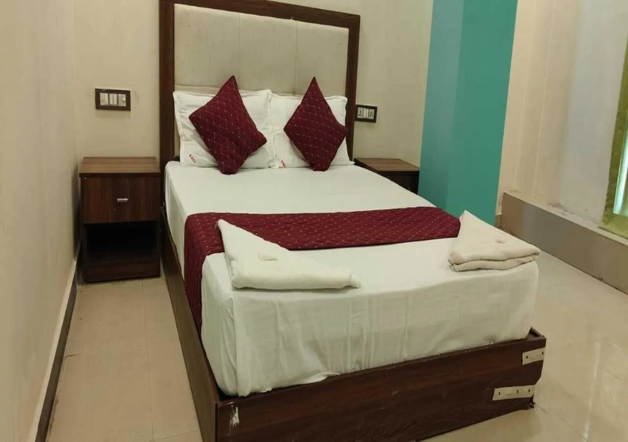 Bed in Hotel Blue Sky Residency