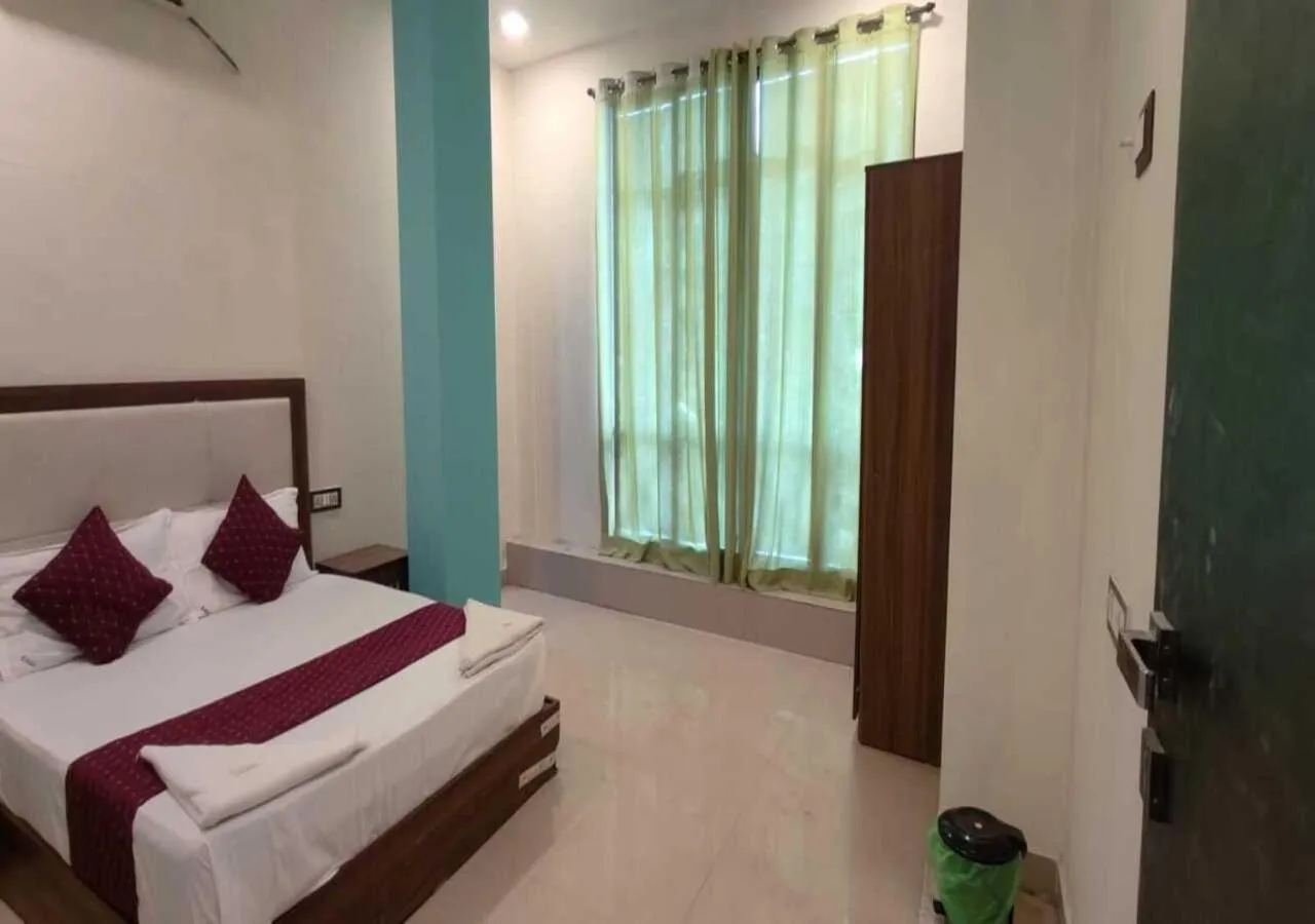 Bed in Hotel Blue Sky Residency