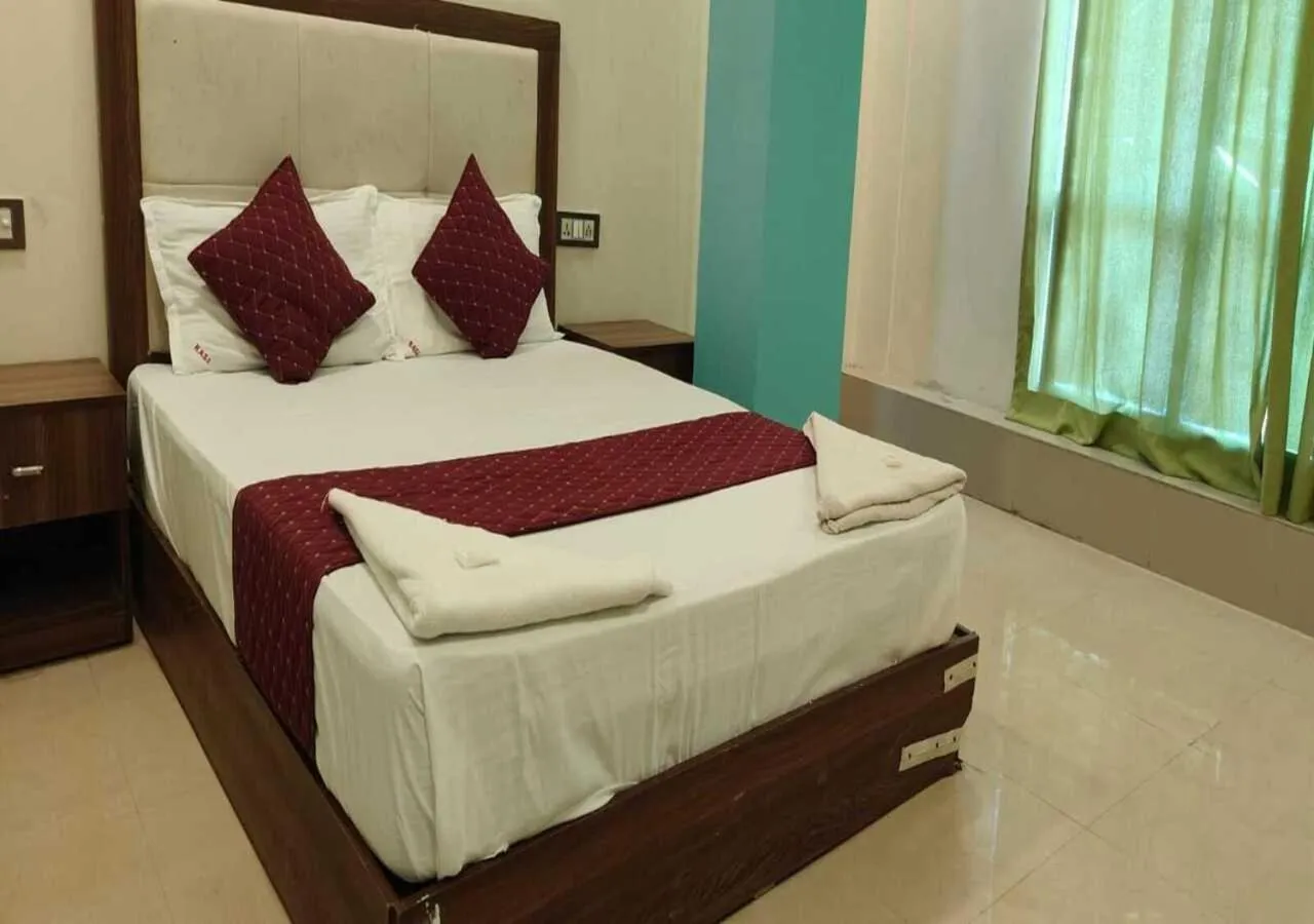 Bed in Hotel Blue Sky Residency