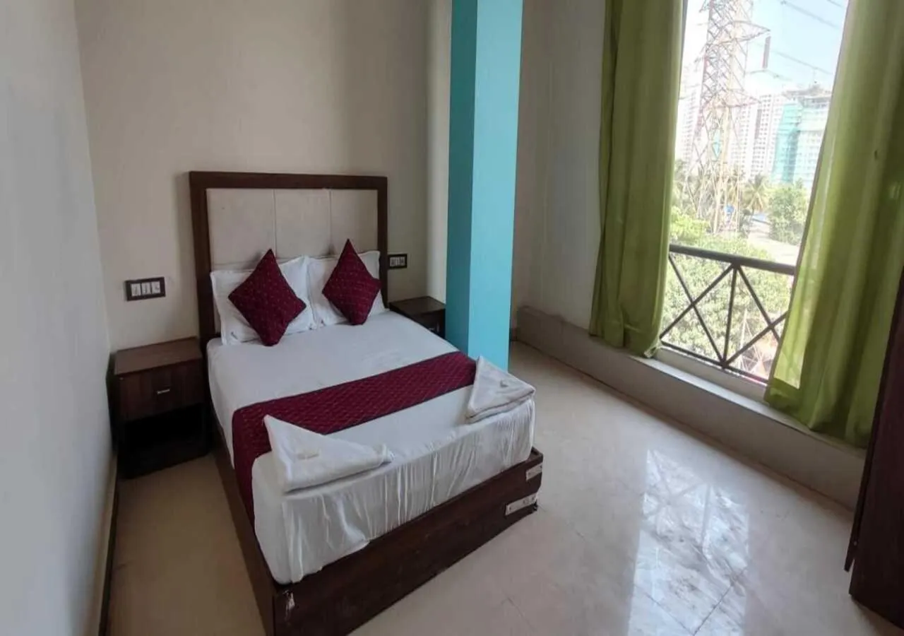 Bed in Hotel Blue Sky Residency