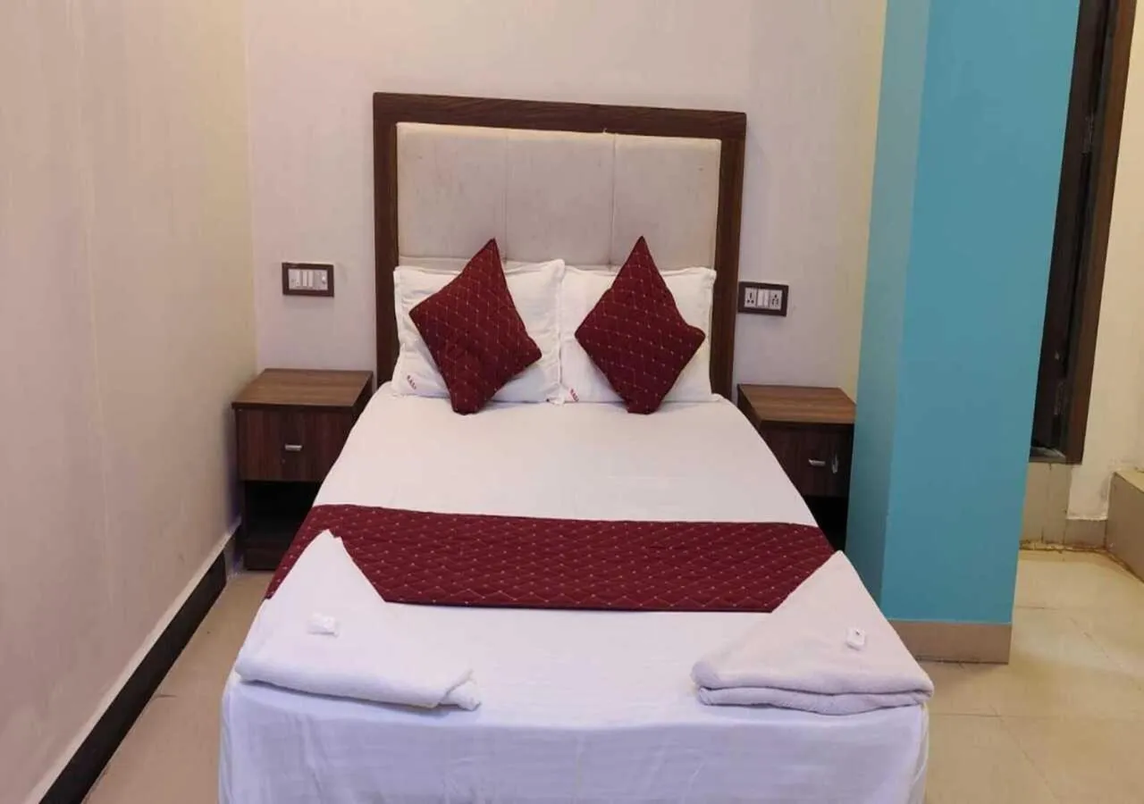 Bed in Hotel Blue Sky Residency