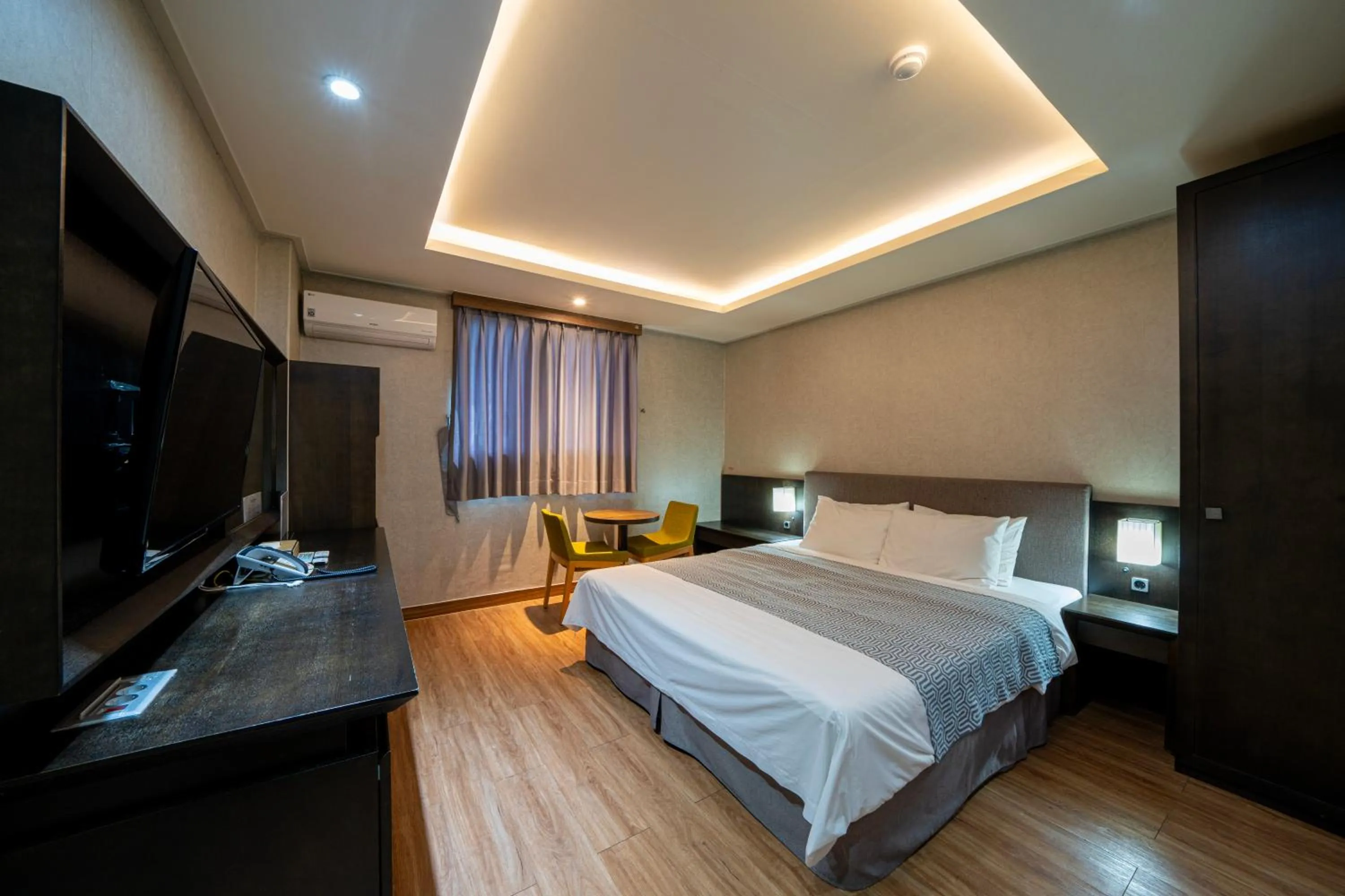 Bed in I-check Hyunjin Hotel