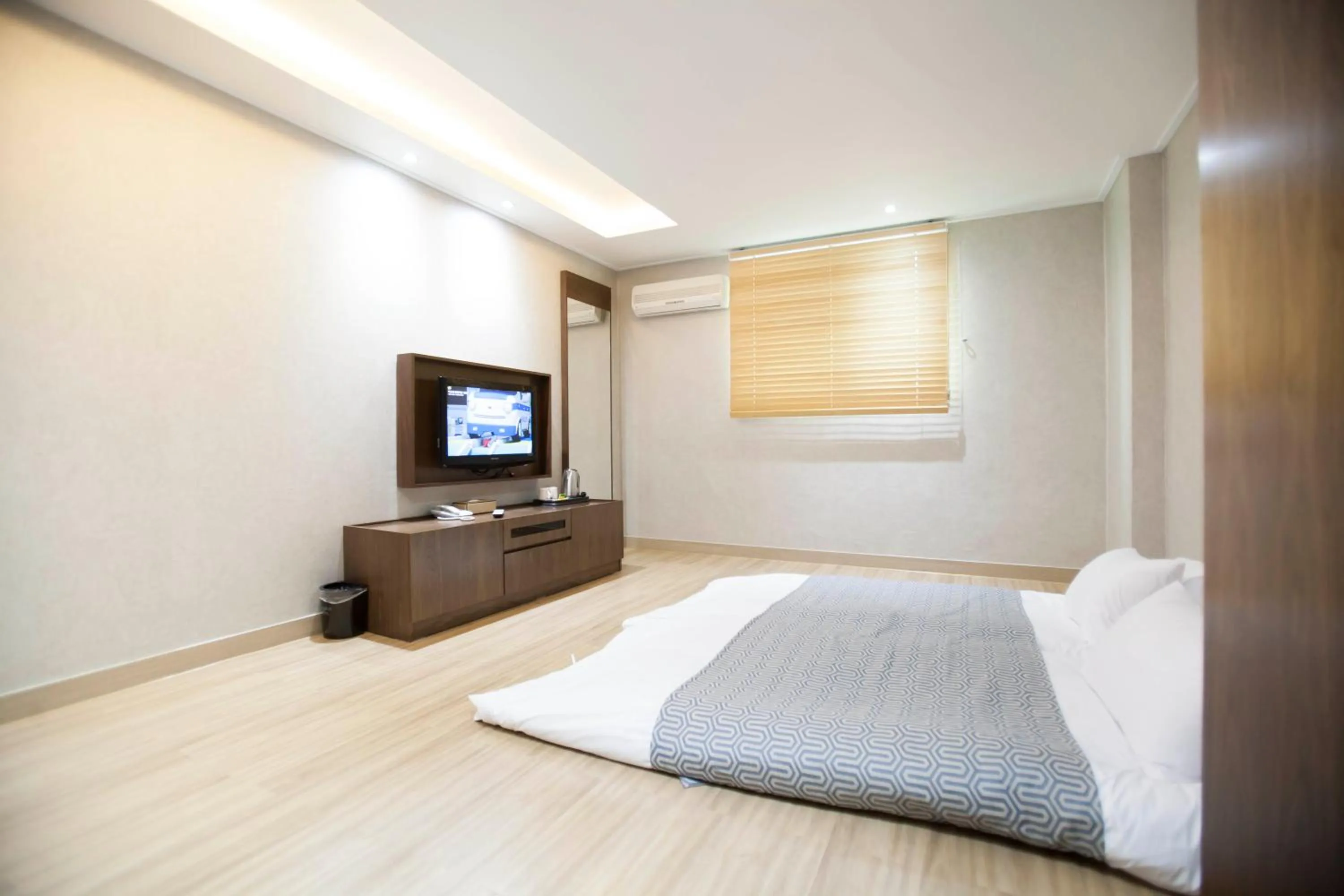 Bed in I-check Hyunjin Hotel