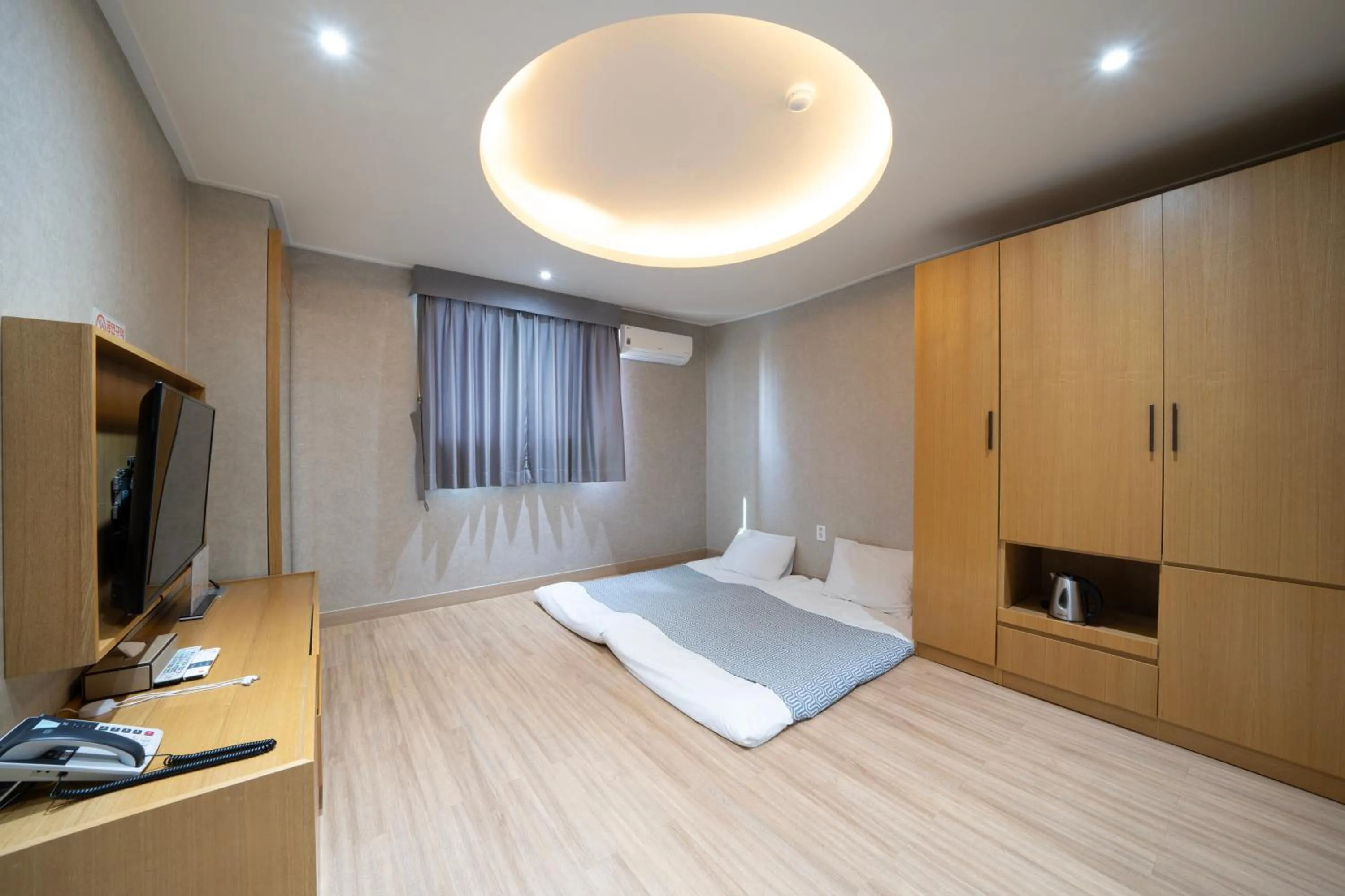 Bed in I-check Hyunjin Hotel