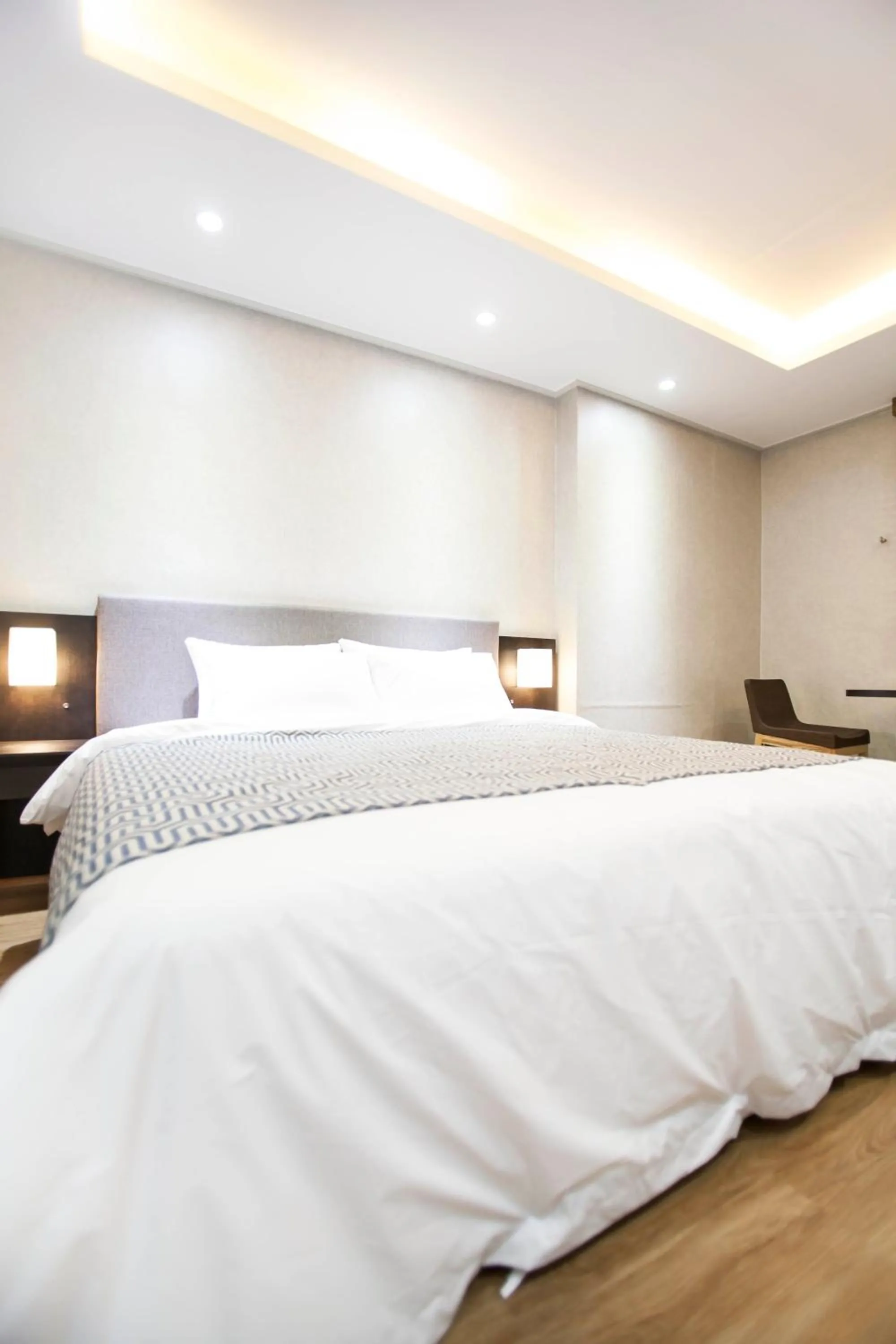 Bed in I-check Hyunjin Hotel