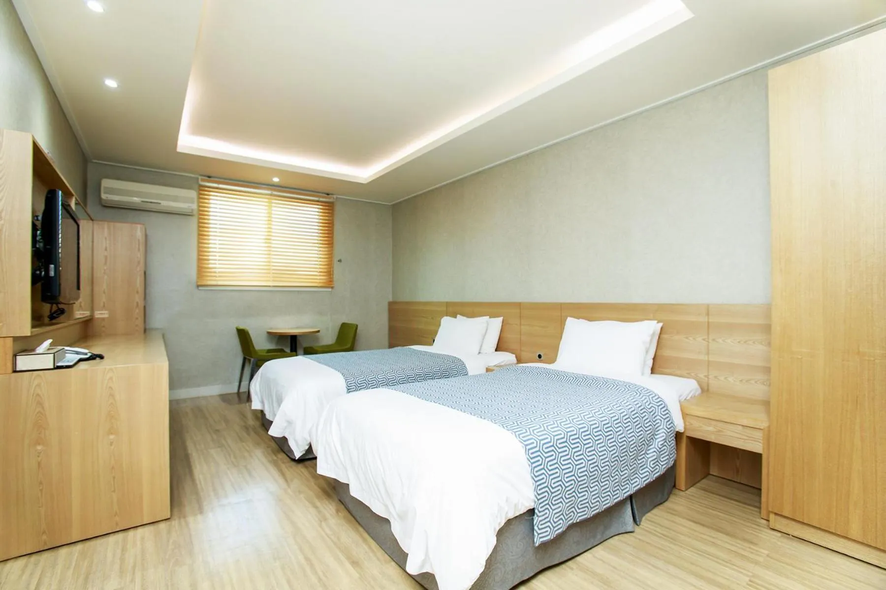 Bed in I-check Hyunjin Hotel