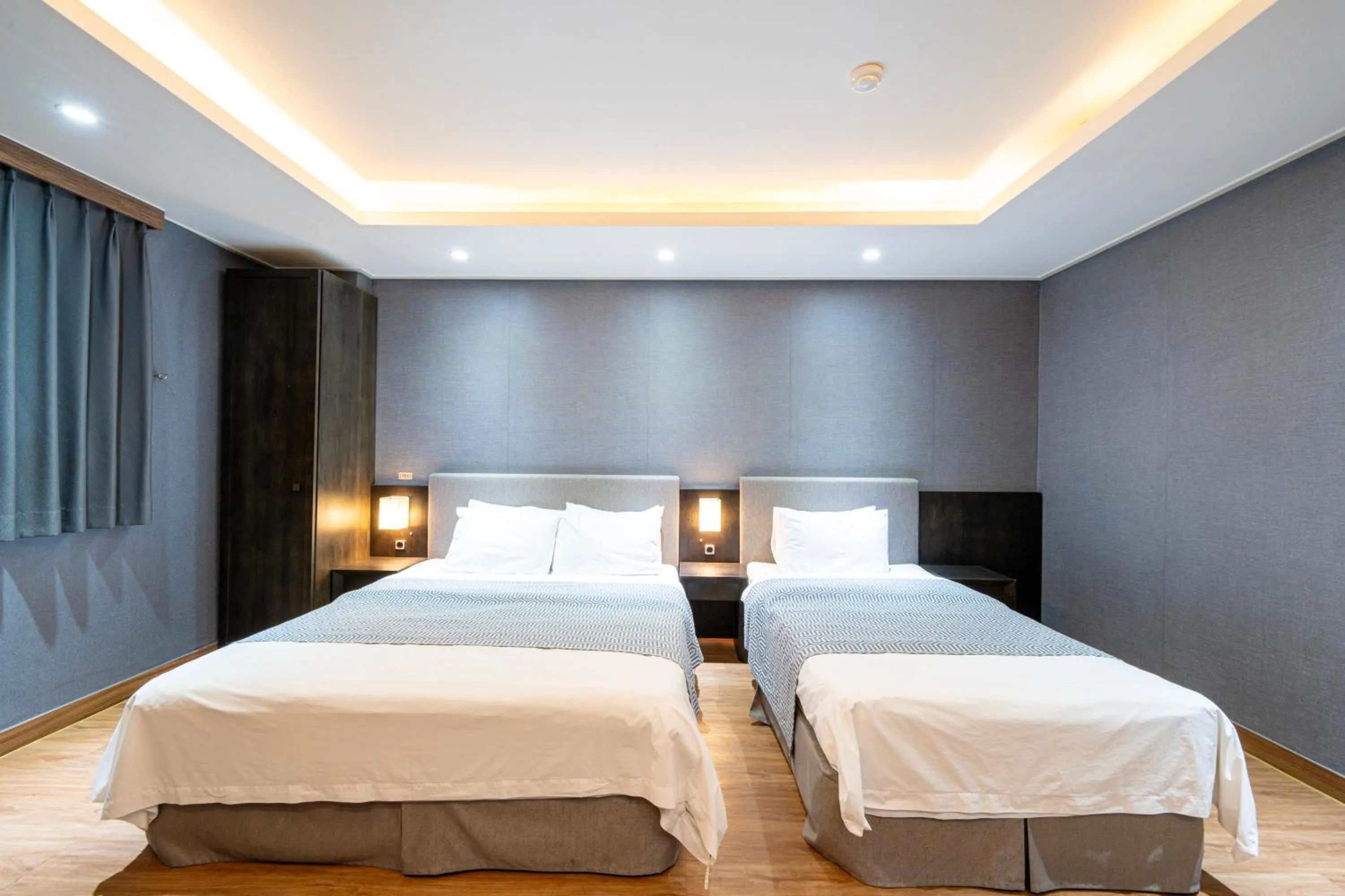 Bed in I-check Hyunjin Hotel