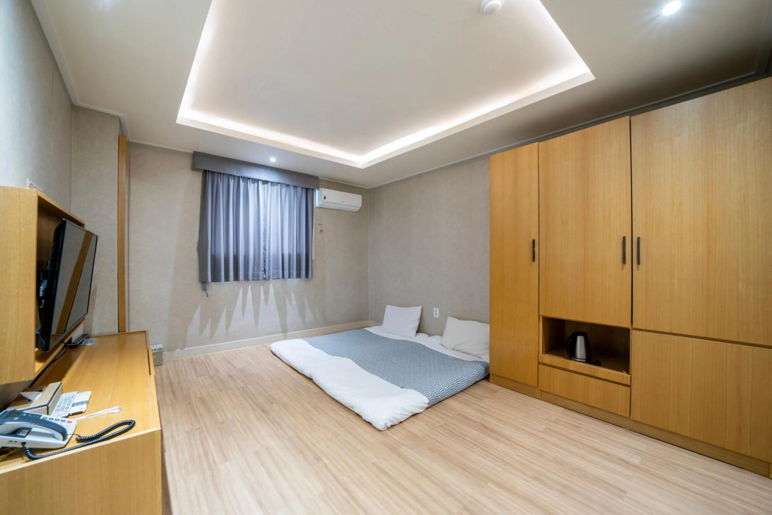 Bed in I-check Hyunjin Hotel