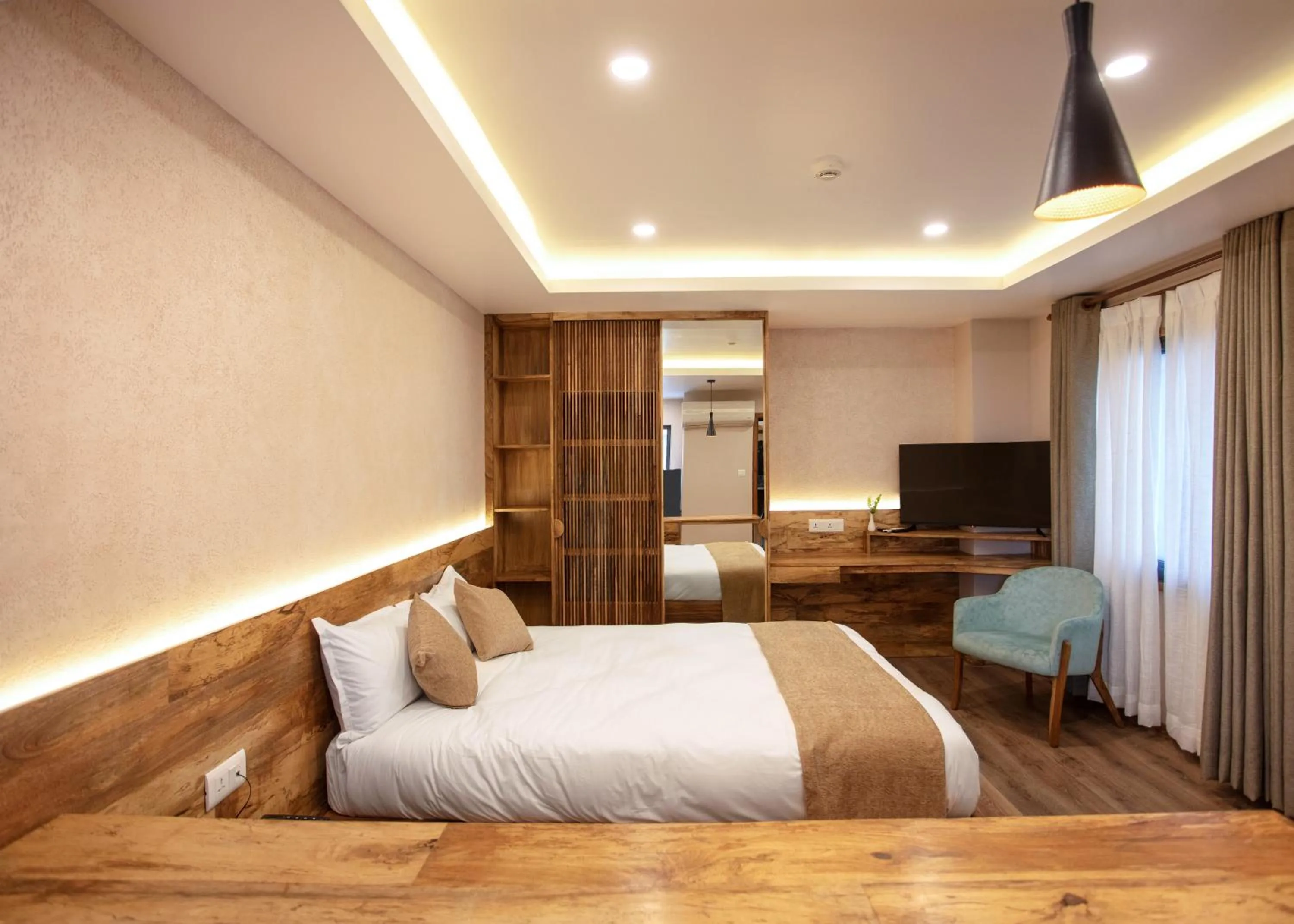 Photo of the whole room, Bed in HOTEL BHRIKUTI TARA