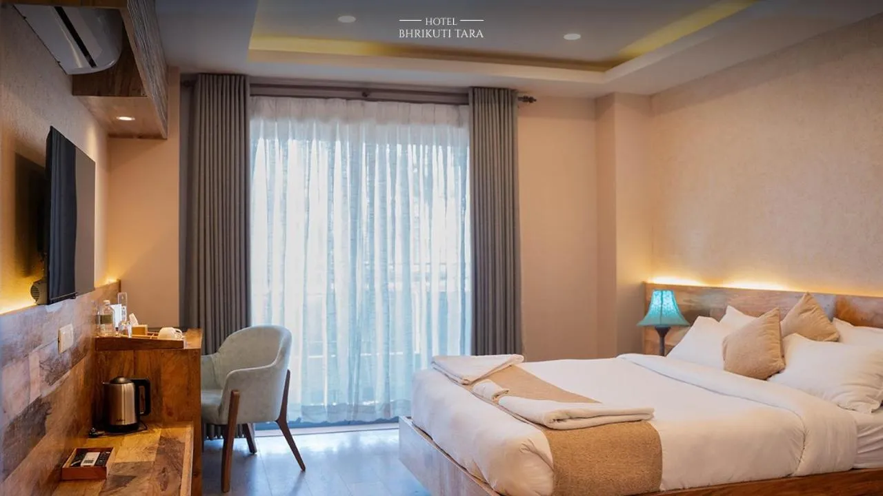 Bed in HOTEL BHRIKUTI TARA