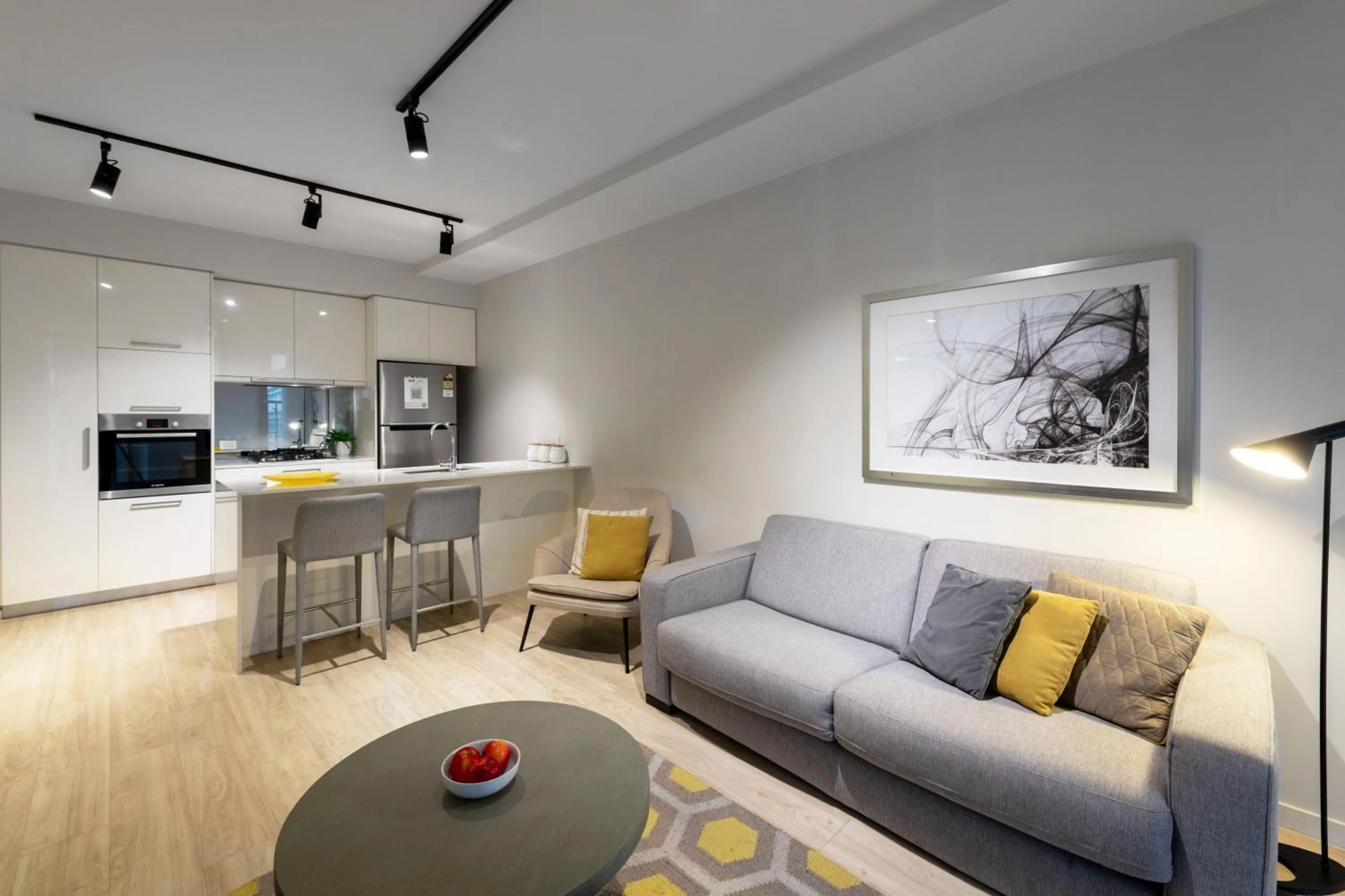 Living room in Arena Apartments by CLLIX