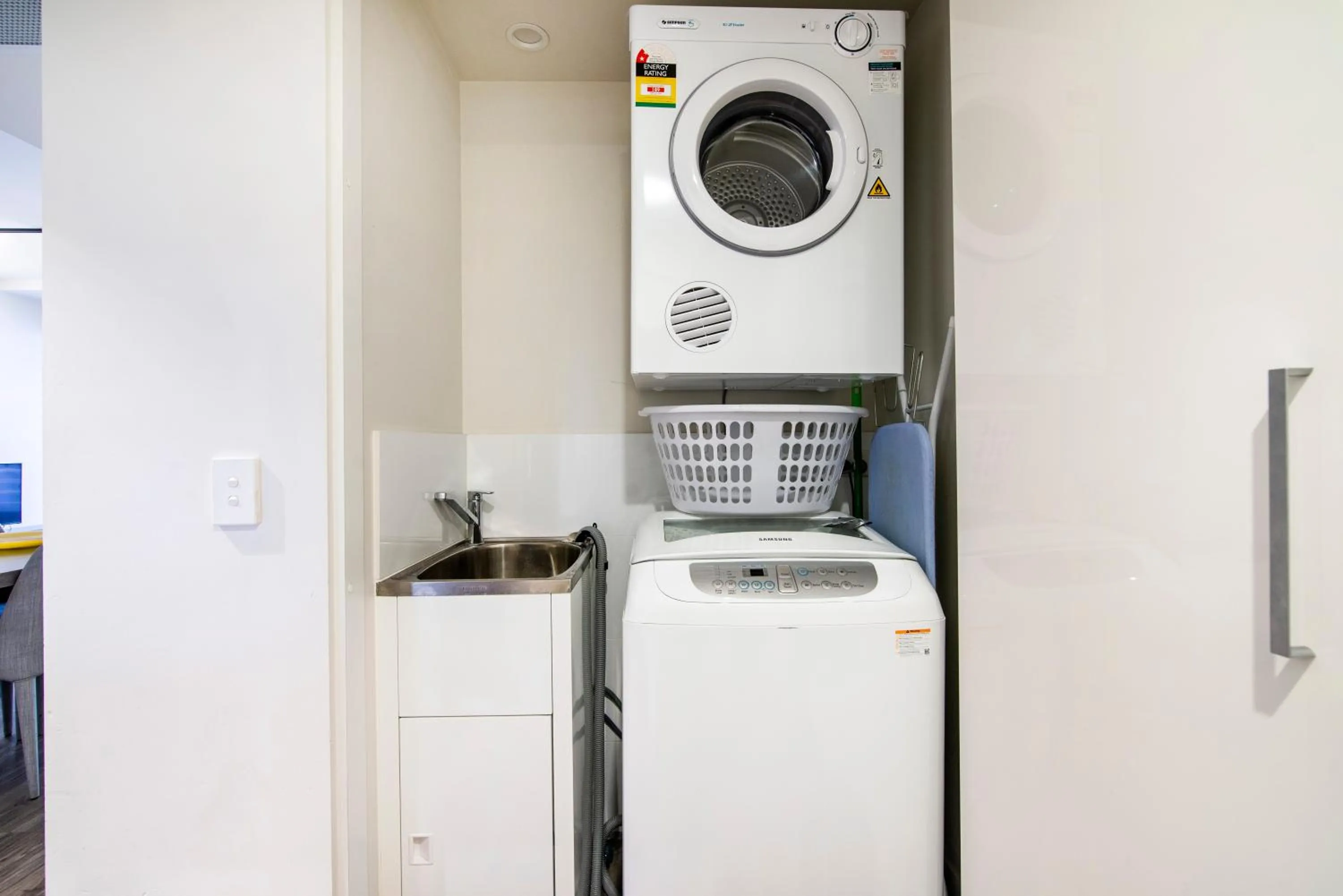 laundry in Arena Apartments by CLLIX