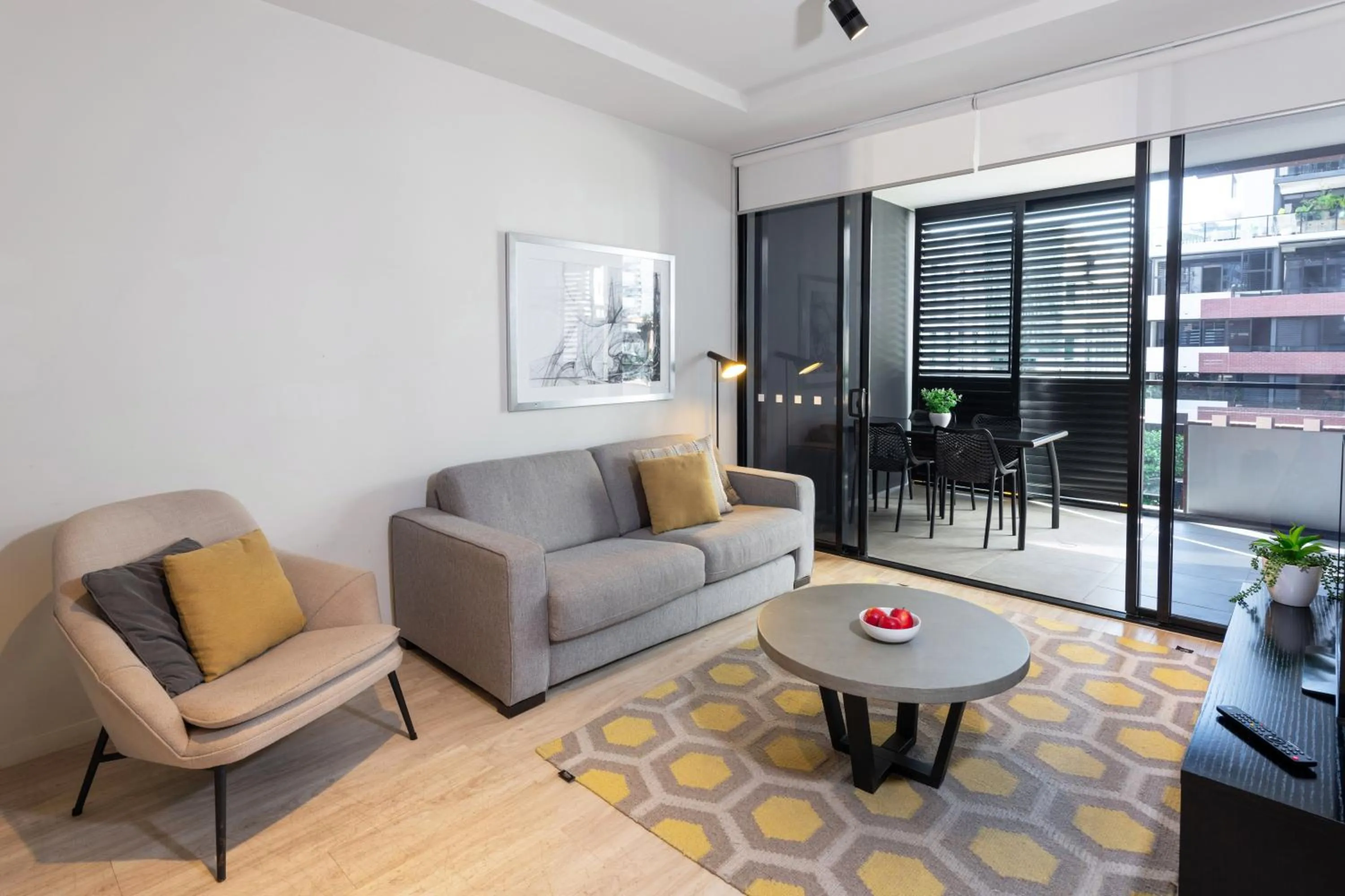 Living room in Arena Apartments by CLLIX