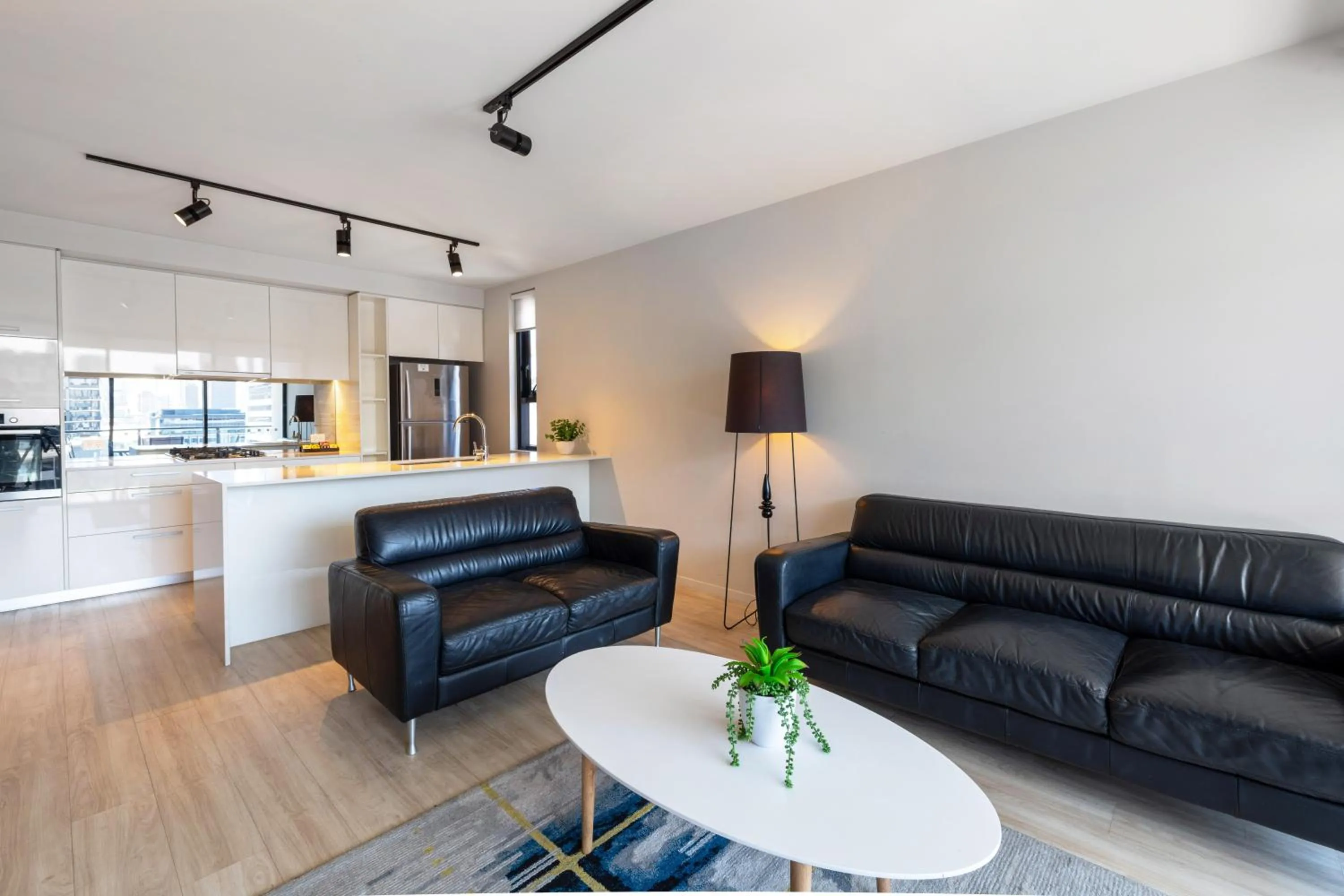 Living room in Arena Apartments by CLLIX