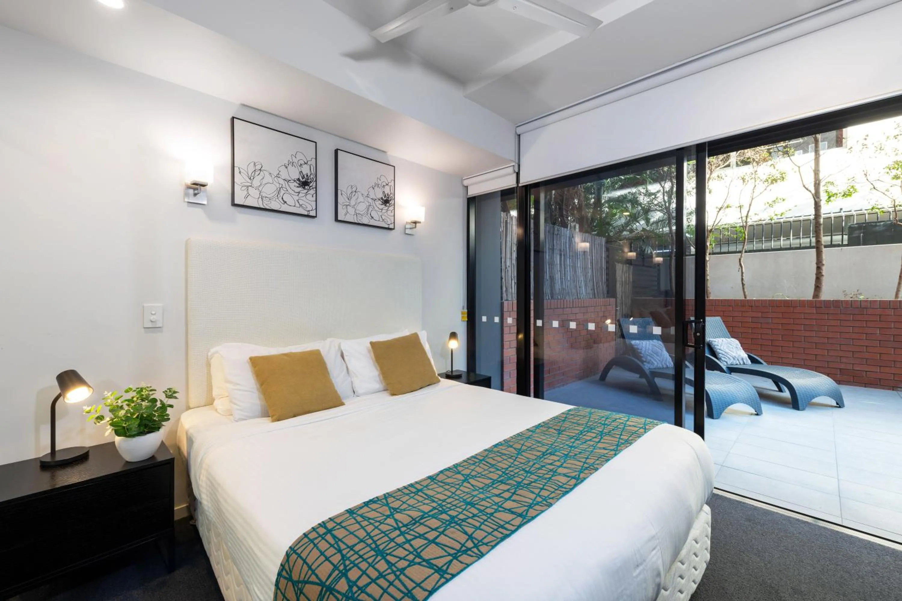 Bed in Arena Apartments by CLLIX