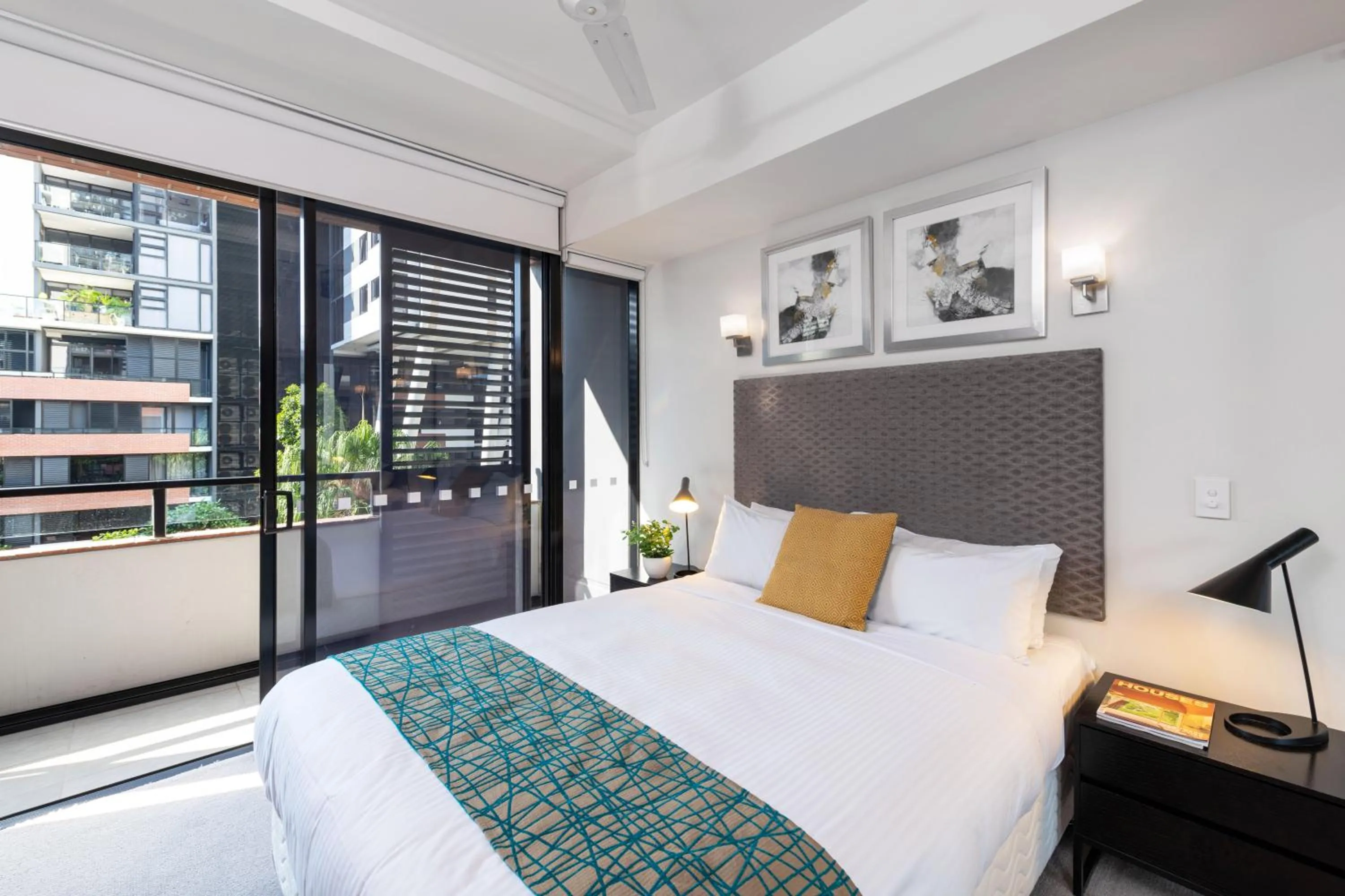 Bed in Arena Apartments by CLLIX