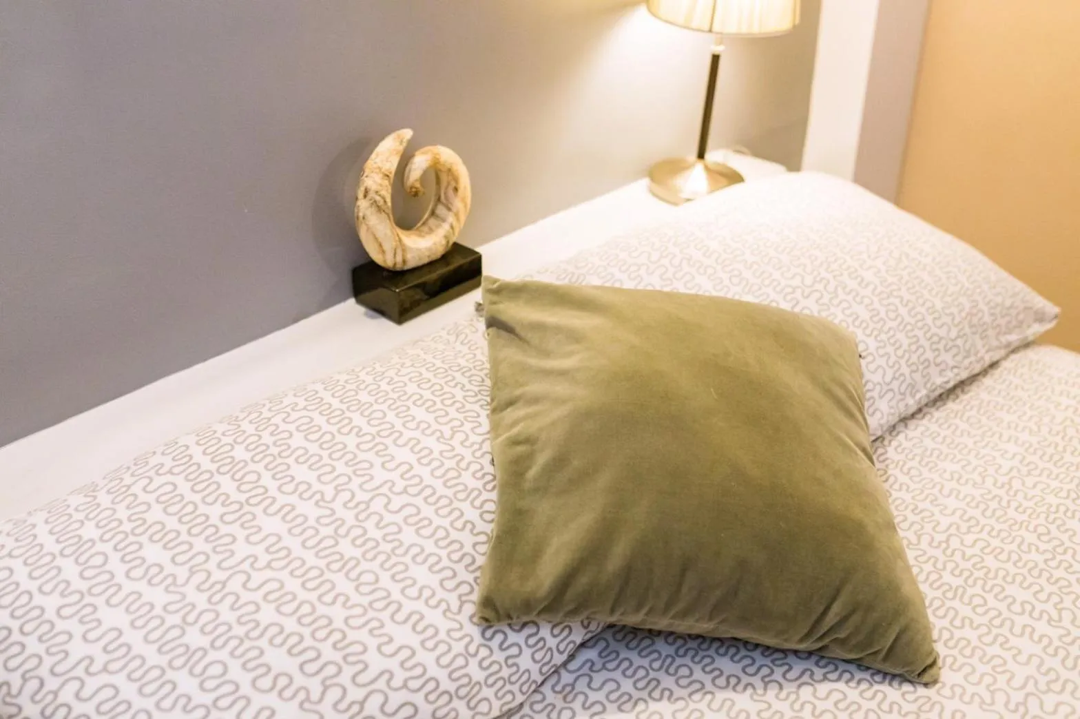 Bed in THE BEACH CHA AM Guest House