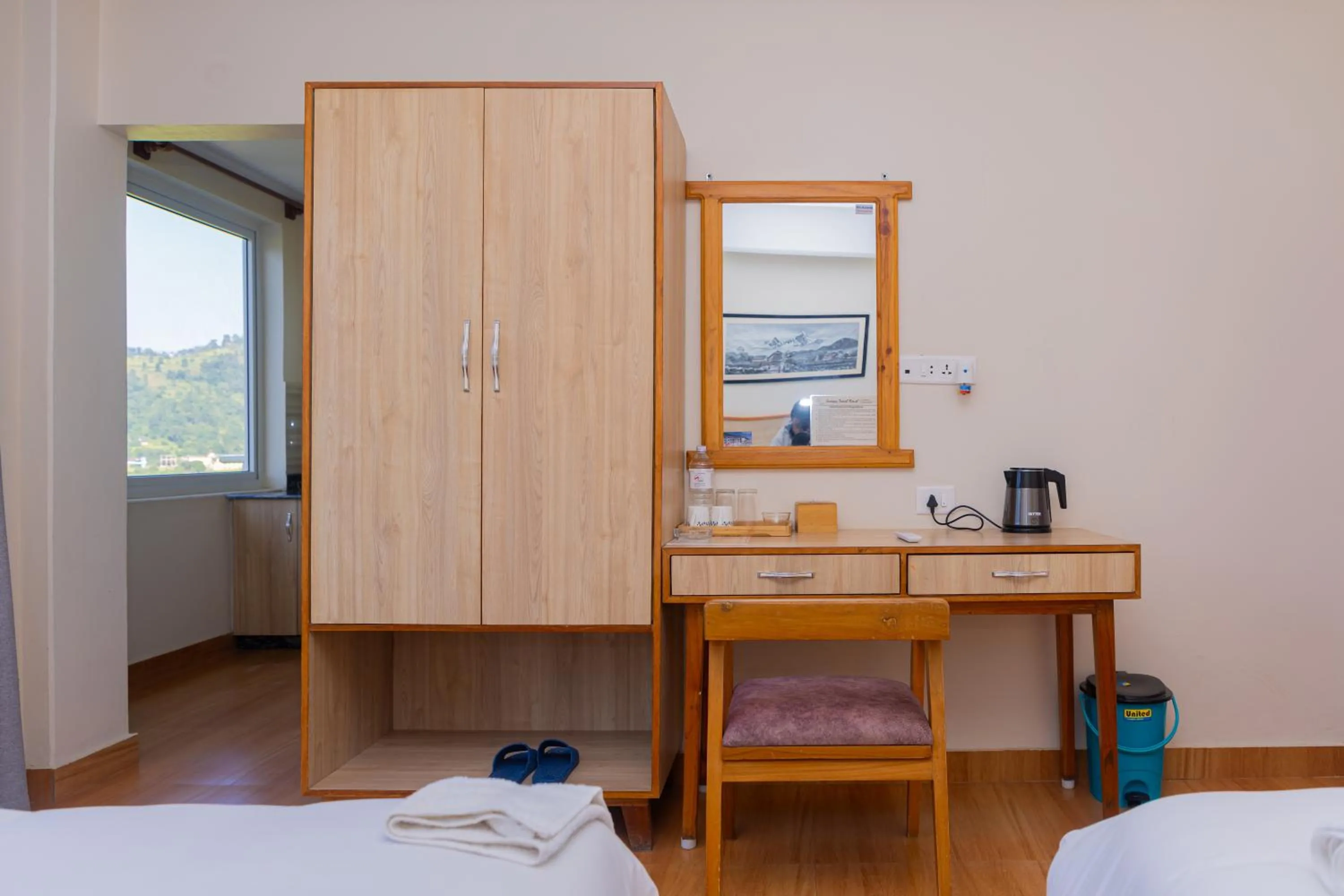 wardrobe, Bed in Samiyog Tourist Resort
