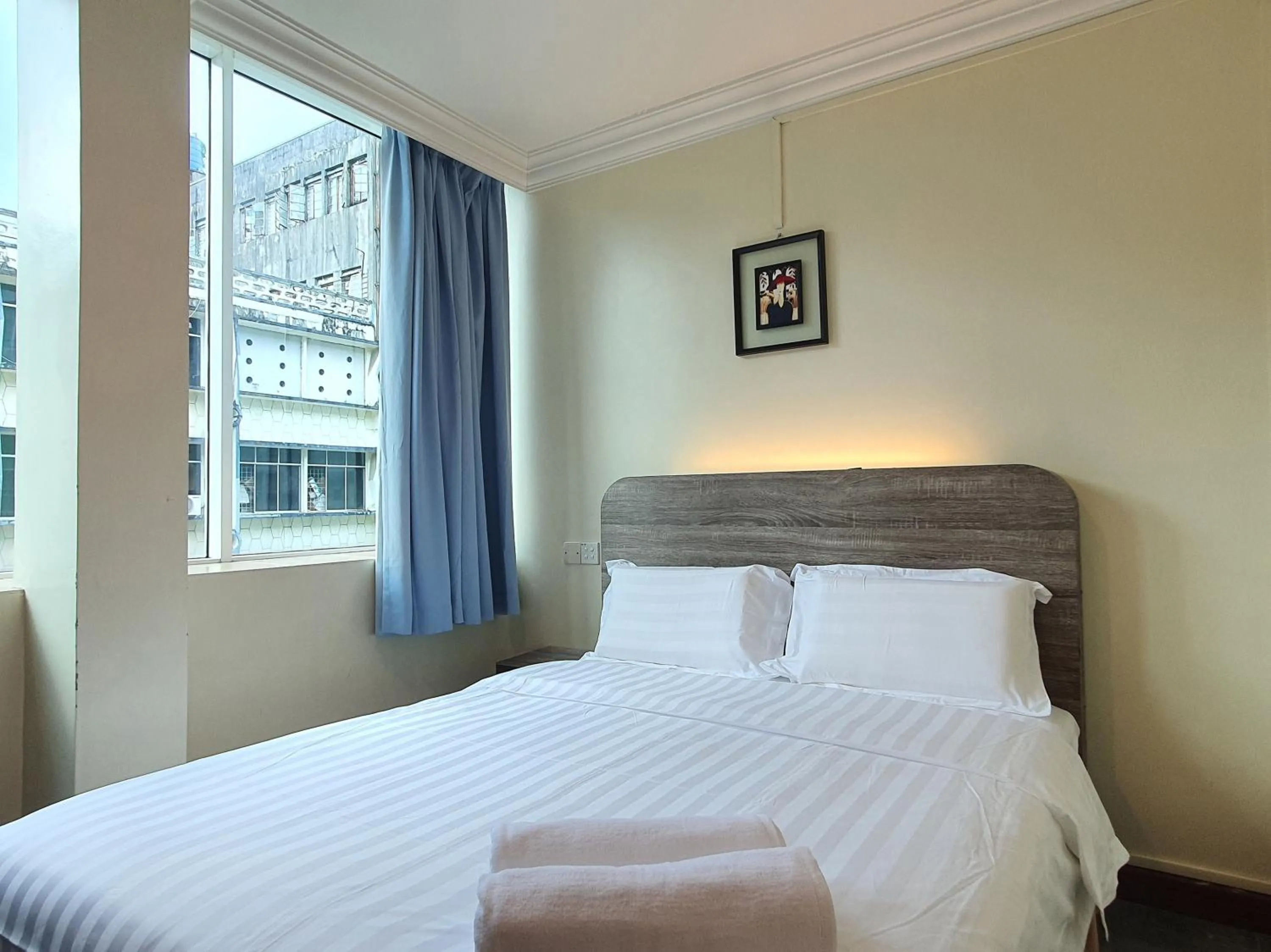 Bedroom, Bed in Capital O 90939 Sandakan Central Hotel