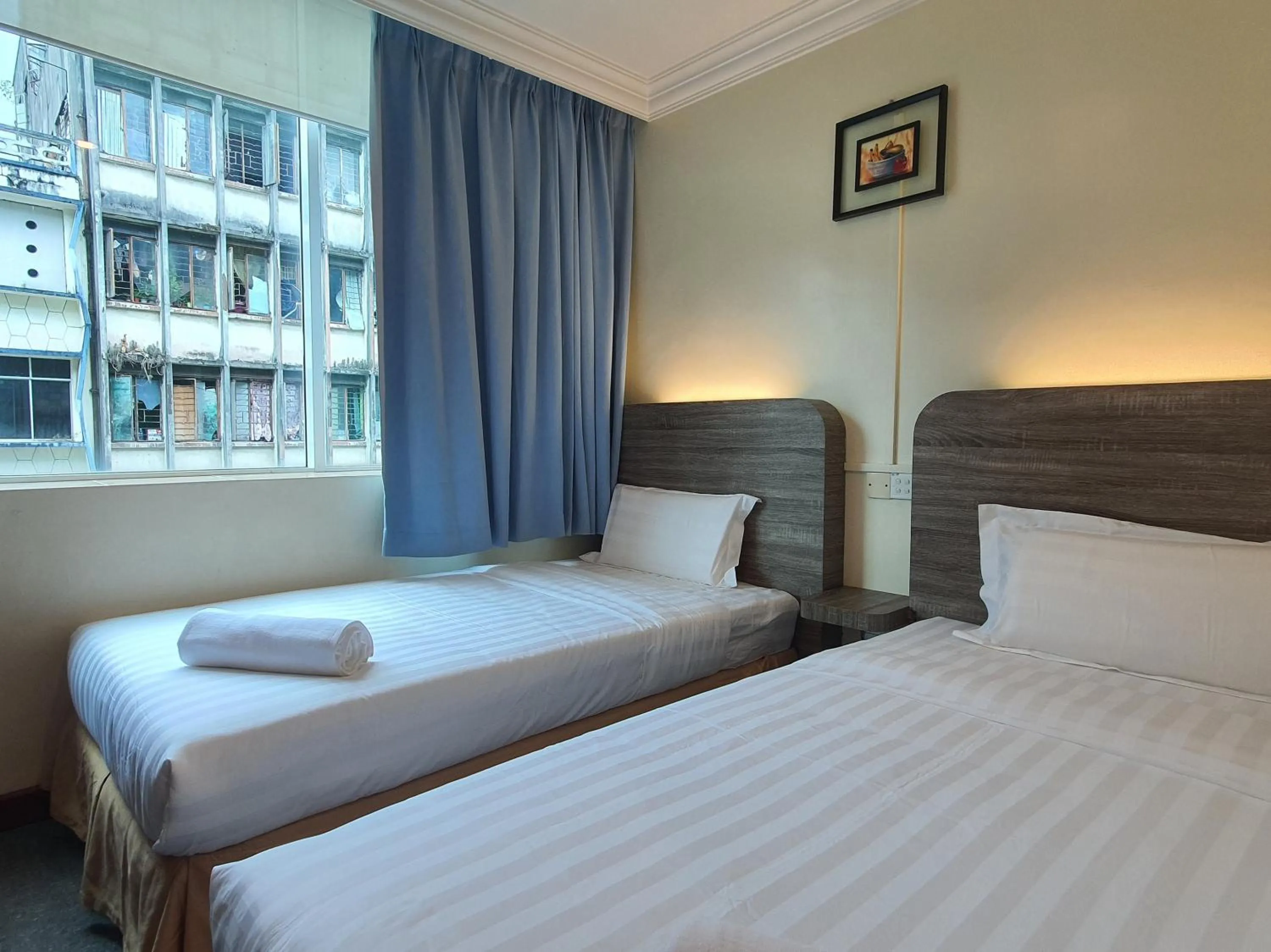 Bedroom, Bed in Capital O 90939 Sandakan Central Hotel