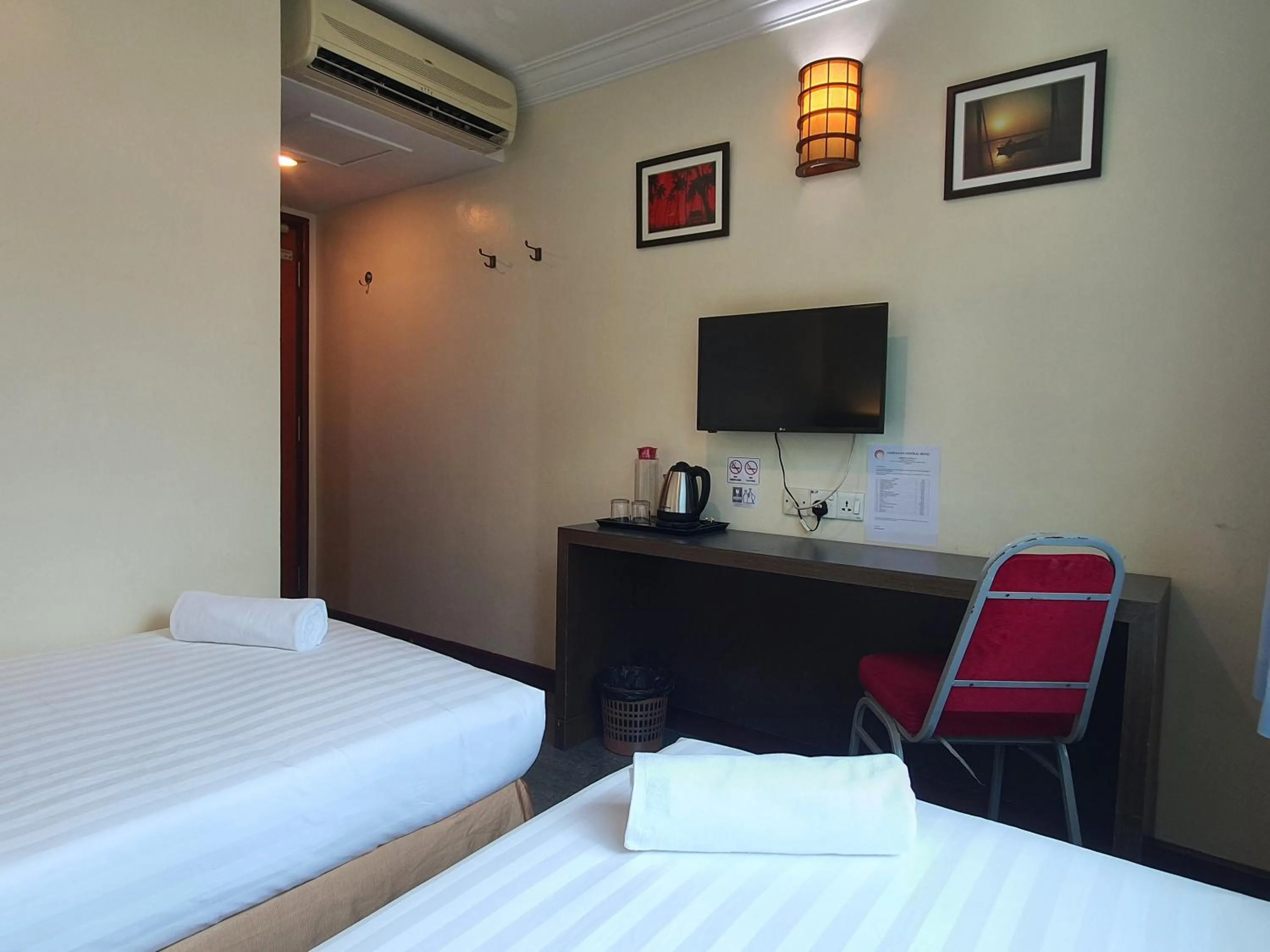 Bedroom, Bed in Capital O 90939 Sandakan Central Hotel