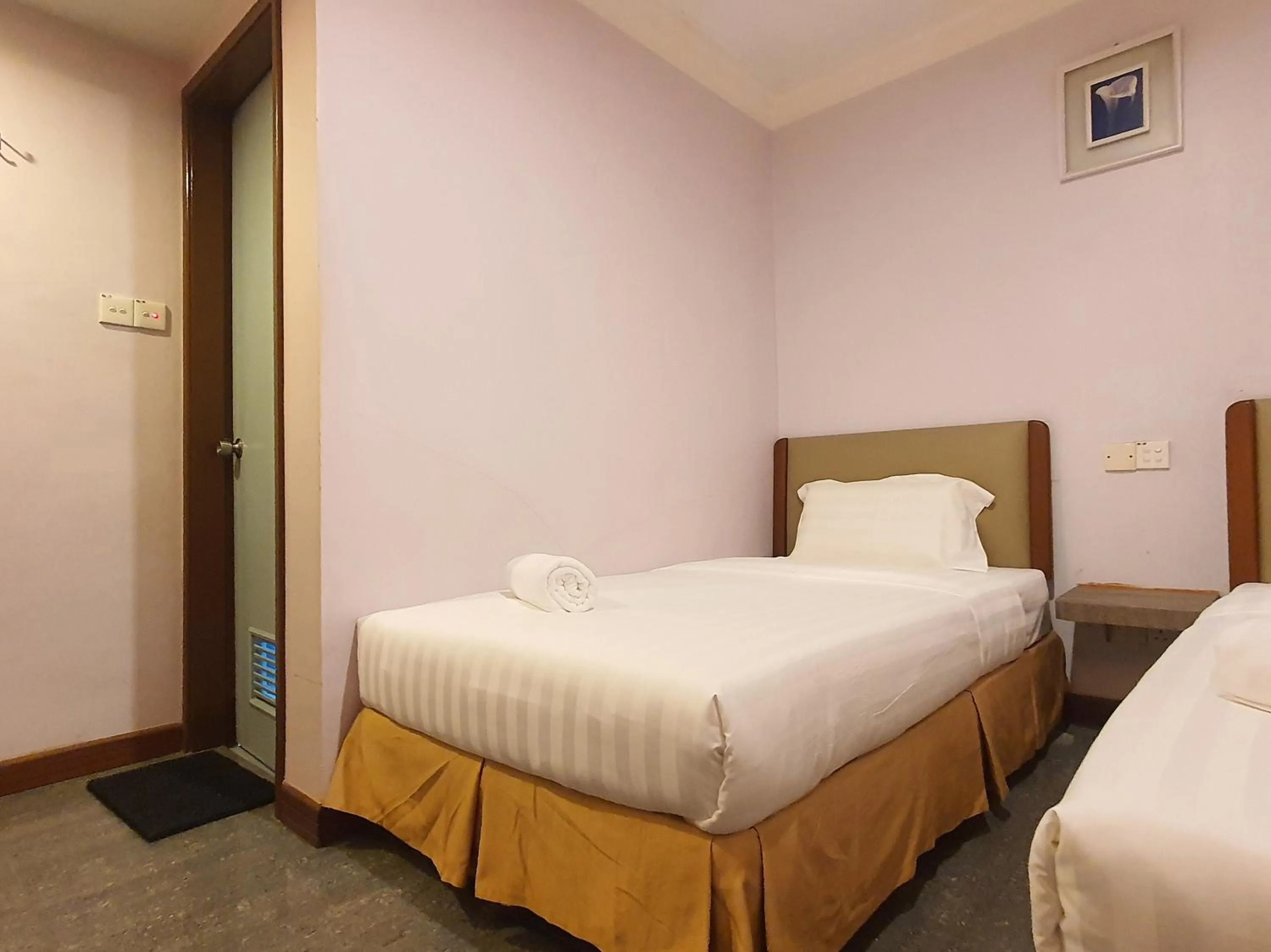 Bedroom, Bed in Capital O 90939 Sandakan Central Hotel