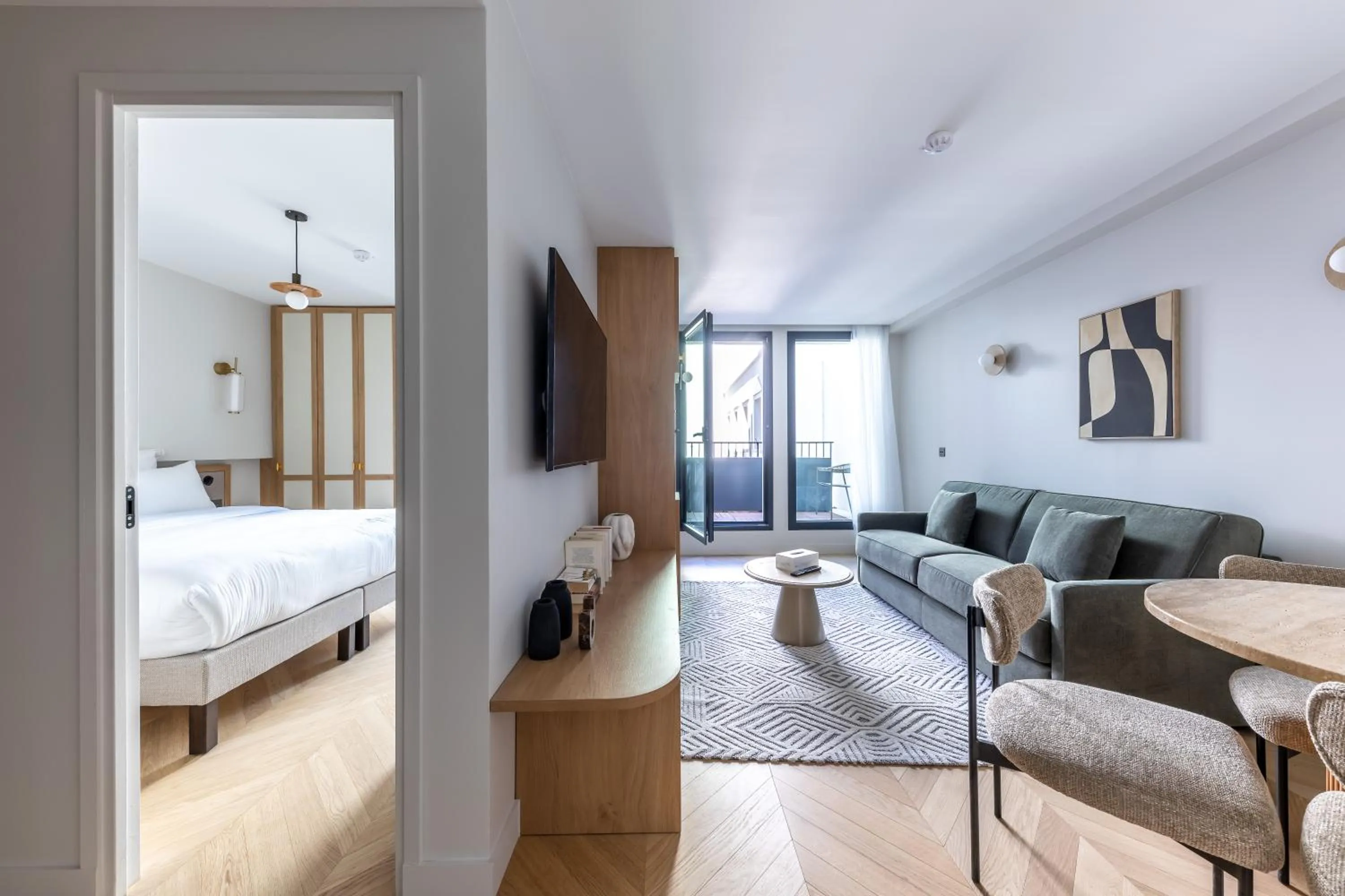 Living room, Bed in Quartier Libre Opera