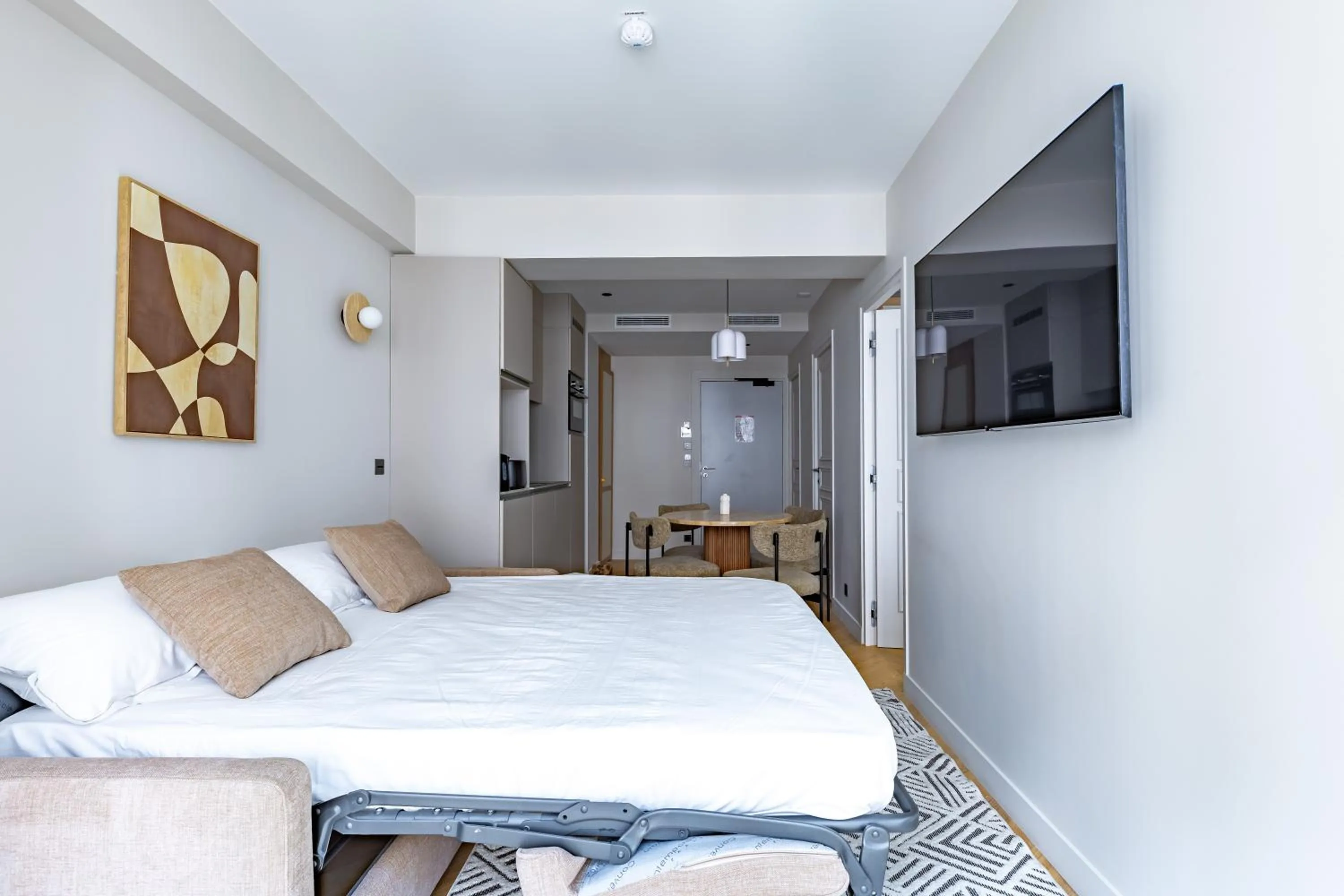 Living room, Bed in Quartier Libre Opera